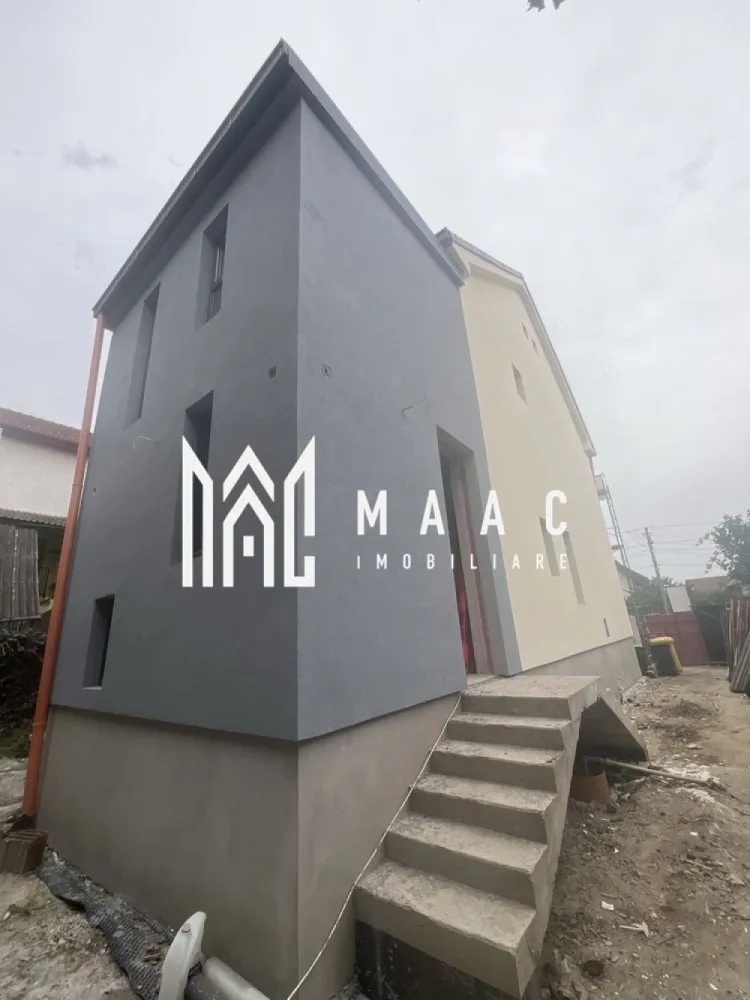 Casa moderna - 297 MPU I Vasile Aaron I Garaj I 318 MP Teren - MAAC Imobiliare vă propune spre vânzare o proprietate complet renovată în 2025, caracterizată printr-un design modern, compartimentare inteligentă și multiple posibilități de utilizare – locuință, birou, spațiu comercial sau investiție în regim hotelier.

 Caracteristici generale:

Proprietatea este alcătuită dintr-o casă D+P+E+M, teren cu acces pe două străzi și garaj individual.
Construcția a fost extinsă și reconfigurată pentru a răspunde cerințelor actuale de confort, funcționalitate și eficiență energetică.

Detalii construcție – 297 mp utili

Demisol (81 mp): 2 camere, baie, spațiu tehnic, zonă de depozitare/pivniță sub casa scării.

Parter (81 mp): living generos cu bucătărie, cameră suplimentară, baie, spațiu tehnic și hol.

Etaj (81 mp): dormitor matrimonial cu dressing walk-in, baie cu două intrări, spațiu tehnic și 2 camere cu design pe două niveluri – cu zonă de living multifuncțională la nivelul inferior și spațiu privat (birou/dressing/odihnă) la nivelul superior, cu baie proprie.

Mansardă (49 mp): două zone pentru dormitor/birou, două băi și două dressinguri walk-in, conectate la camerele multifuncționale de la etaj.

Acest concept arhitectural oferă eleganță, volum și flexibilitate, fiind ideal pentru o amenajare premium și un stil de viață contemporan.

 Teren – 318 mp

Alei pietonale și acces auto (capacitate 2–3 mașini în interiorul proprietății, plus 2 locuri suplimentare în exterior)

Grădină amenajabilă și spațiu pentru terasă

Acces dublu: auto și pietonal în față, acces pietonal suplimentar în spate

Garaj de 20 mp – cu șaht auto, structură din cărămidă și placă de beton

 Dotări și specificații tehnice:

Două accese separate, fiecare deservind zone diferite ale casei, ambele prevăzute cu sisteme de control acces și video-interfon.

Sistem de supraveghere video (8 puncte de monitorizare).

Demisol cu branșamente separate la electricitate (monofazat) și gaz – cu posibilitate de funcționare independentă.

Parter, etaj și mansardă alimentate prin branșament electric trifazat și gaz separat.

Instalații refăcute complet: apă, canalizare nouă, fibră optică.

Izolație exterioară cu vată bazaltică de 10 cm – performanță termică și fonică superioară.

Soclu izolat cu polistiren extrudat de 5 cm – protecție împotriva umezelii.

Tâmplărie PVC premium cu geam termopan.

Pereți solizi: cărămidă plină la parter (40 cm), zidărie Porotherm la etaj și mansardă (25 cm).

Trasee electrice și termice pregătite pentru sistem de climatizare.

🧭 Avantaje majore:

✅ Proprietate complet renovată și modernizată în 2025
✅ Compartimentare inteligentă, cu posibilitatea utilizării fiecărui nivel independent
✅ Ideală pentru rezidență, birouri, clinici sau regim hotelier
✅ Acces dublu și garaj propriu
✅ Finisaje și materiale de înaltă calitate
✅ Oportunitate excelentă de investiție
Pentru mai multe detalii și vizionări, precizati telefonic ca ati vazut anuntul cu ID:CP2771546