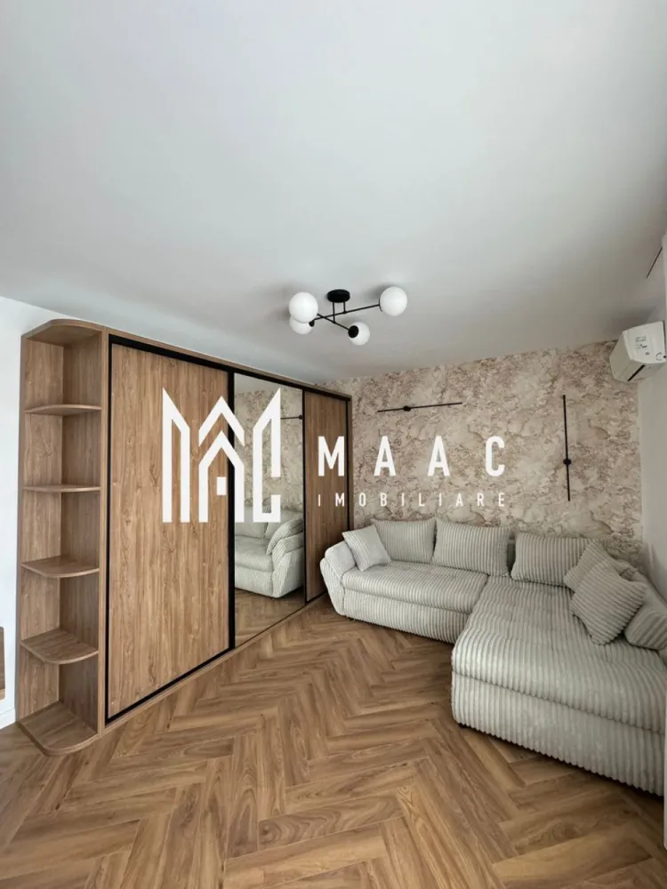 Apartament 2 camere | Etaj 1 | Decomandat | Arhitectilor - MAAC Imobiliare vă propune spre vânzare un apartament deosebit cu 2 camere, situat în cartierul Arhitecților, într-un imobil tip vilă (P+2) cu doar 9 apartamente – o alegere ideală pentru cei care își doresc un cămin liniștit, rafinat și cu o calitate superioară a vieții. Caracteristici generale: Suprafață totală: 57 mp (50 mp utili + balcon generos de 7 mp) Etaj: 1 din 2 Compartimentare: complet decomandat Orientare sudică – lumină naturală pe tot parcursul zilei Loc de parcare privat inclus – situat chiar în fața imobilului Finisaje & Dotări Premium: Renovare completă realizată cu ajutorul unui designer de interior Investiție de peste 27.000 EUR în materiale și finisaje de calitate superioară Electrocasnice de top, eficiente energetic, integrate armonios în spațiu Mobilier realizat integral la comandă, gândit pentru a optimiza fiecare metru pătrat Ambianță modernă, cu atenție la detalii și confort sporit Avantaje adiționale: Bloc tip vilă cu regim redus de înălțime – doar 2 etaje și 9 apartamente Zonă aerisită și liniștită, ideală pentru rezidență permanentă Apartament liber de sarcini, disponibil imediat Acceptăm plată cash sau prin credit ipotecar Preț negociabil în funcție de modalitatea de plată Această proprietate reprezintă o combinație rară între design, confort și locație. Perfectă pentru o familie tânără, un cuplu sau ca investiție într-o zonă în continuă dezvoltare. Contactați echipa MAAC Imobiliare pentru mai multe detalii sau pentru a programa o vizionare! ID: CP2768715.