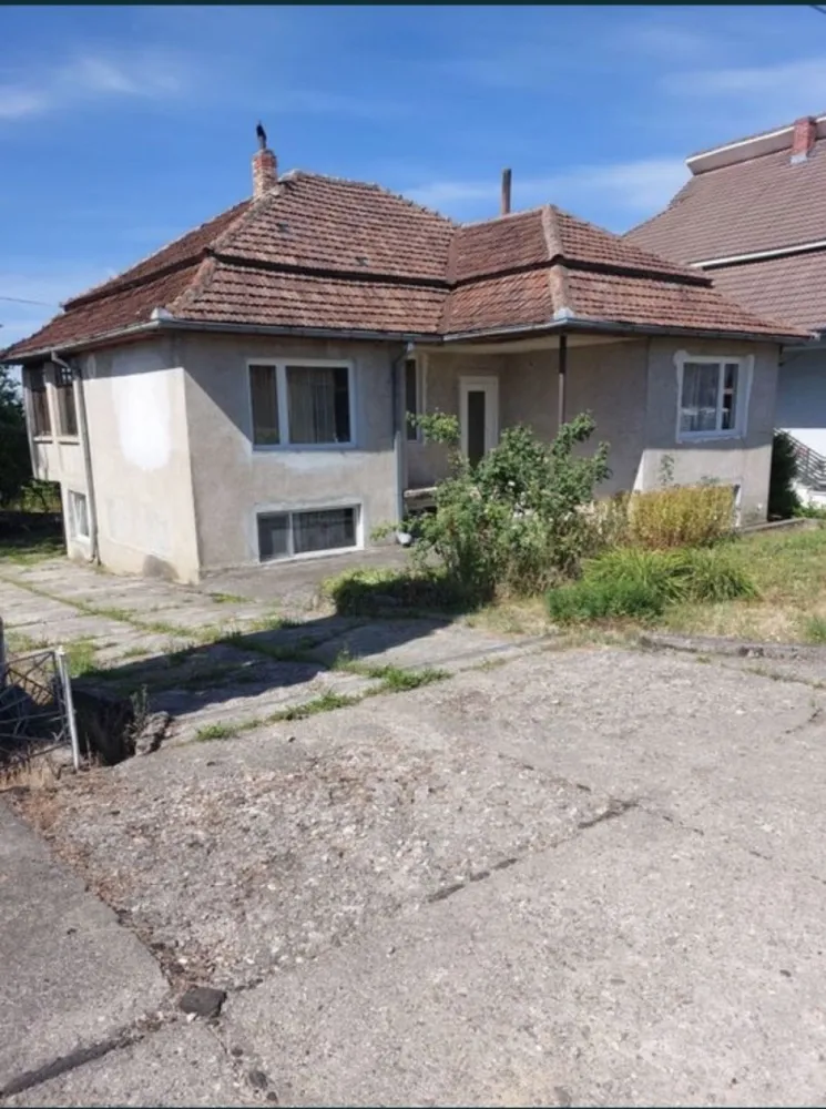 Casa de vanzare in Negresti Oas - Casa P+M situata in Negresti Oas cu teren aferent în suprafață de 1100 mp locuibila,are toate utilitățile