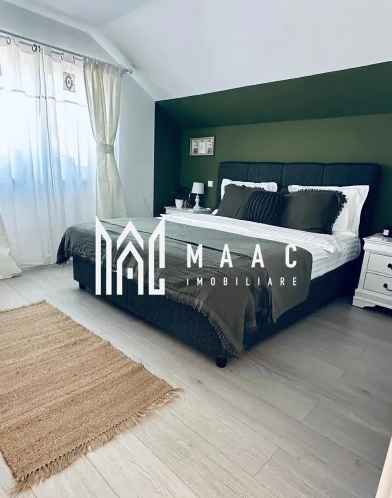 Casa individuala | 216 mp utili | Teren 500 mp | Veterani - MAAC Imobiliare vă propune spre vânzare o casă individuală finalizată în perioada 2017–2018, amplasată într-un cartier aerisit de case, ce oferă liniște, intimitate și acces facil către autostradă și zona comercială.

Proprietatea are o suprafață utilă de 216 mp și este edificată pe un teren de 500 mp, beneficiind de curte individuală, terasă generoasă și garaj închis. Construcția este solidă, realizată cu design modern și materiale de înaltă calitate.

Compartimentarea este practică și bine organizată:

parter:
-living spațios cu șemineu și distribuție de căldură către etaj
-bucătărie separată
-cămară
-cameră suplimentară (birou sau dormitor)
-baie complet echipată (cabină de duș, wc, bideu)
-hol larg și luminos
-spațiu tehnic
-debara

etaj:
-2 dormitoare
-dressing (poate fi transformat în dormitor)
-2 băi (una matrimonială cu cadă și cabină de duș, una secundară)
-budoar
-hol spațios și luminos

Dotări și finisaje:
-încălzire în pardoseală pe toată suprafața
-izolație cu vată bazaltică
-tâmplărie PVC premium
-parchet Egger 12 mm
-plăci mari și gresie premium în băi
-baterii și obiecte sanitare de calitate superioară
-finisaje moderne atent selectate

Avantajele acestei case individuale includ poziționarea excelentă, cu acces rapid la autostradă și centre comerciale, spațiile generoase și bine compartimentate, intimitatea oferită de curtea proprie și nivelul ridicat al construcției și finisajelor.

Proprietatea este potrivită pentru o familie care își dorește un cămin modern, spațios și durabil, într-o zonă rezidențială bine conectată.

Pentru mai multe detalii, vă rugăm să menționați numărul CP2706525 la telefon.