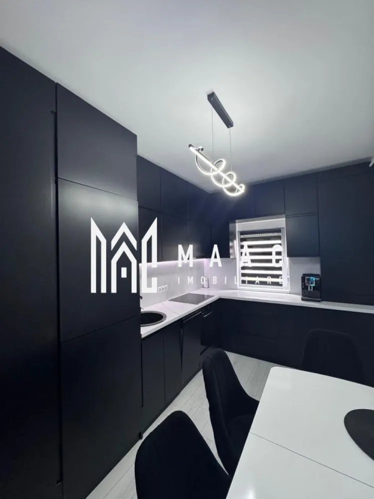 Apartament 3 camere | 2 Locuri de Parcare | Complet Mobilat | Arhitectilor - MAAC Imobiliare vă propune spre vânzare un apartament de lux cu 3 camere, situat la parterul unui imobil cochet cu doar 3 etaje, într-o zonă liniștită în cartierul arhitecților.

Detalii apartament:
Suprafață utilă: 64 mp + balcon de 5 mp
Compartimentare: living spațios, bucătărie separată cu ușă de sticlă, 2 dormitoare elegante, baie modernă
Finisaje si dotări premium: încălzire în pardoseală, centrală termică Bosch, mobilier MDF vopsit la comandă, șemineu electric funcțional, obloane la toate geamurile
Electrocasnice: TV QLED 165 cm, televizoare UHD suplimentare, mașină de spălat si uscător, mașină de spălat vase, plită, hotă, frigider și cuptor încorporate

Avantaje:
Apartament complet mobilat si utilat complet
Două locuri de parcare incluse (cu blocatoare montate)
Zonă aerisită cu multă verdeață
Ideal pentru cei care își doresc un stil de viață exclusivist

Pentru mai multe detalii sau pentru a programa o vizionare, vă rugăm să ne contactați.
Specificați ID-ul CP2684245.