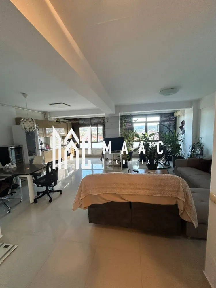Apartament Ultracentral | 2 camere | 95 mp utili - MAAC Imobiliare vă propune spre inchiriere un apartament modern cu o locație excelentă, situat la doar câteva minute de Centrul orașului Sibiu și de noul Mall, în apropiere de Autogară și Gară.

 Detalii apartament:
Suprafață utilă: 95 mp
Compartimentare: Living generos + Dormitor spațios
2 băi moderne
Mobilat și utilat complet
2 unități aer condiționat
Electrocasnice premium: mașină de spălat AEG, uscător de rufe, mașină de spălat vase
Clădire dotată cu lift modern

 Avantaje și facilități:
Living amplu, perfect pentru relaxare și timp petrecut cu familia
Dormitor luminos, cu suficient spațiu pentru un pat matrimonial și mobilier
Priveliște spectaculoasă spre Centrul orașului și Dealul Gușteriței
Locație centrală, cu acces rapid la școli, magazine, mijloace de transport și zone de interes
Doar 5 minute de mers pe jos până în Piața Mare

📞Contactează-ne pentru mai multe detalii sau pentru a programa o vizionare, menționați CP2681746!