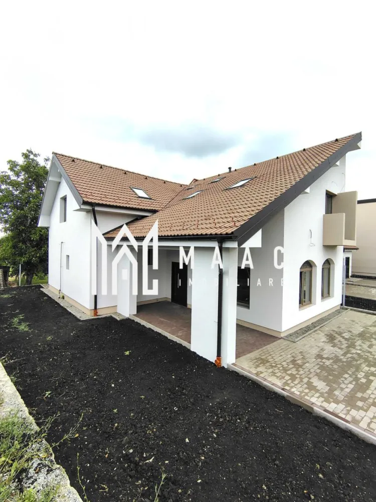 Casa Rezidentiala | 5 Camere | 172 Mp | Șura Mică - MAAC Imobiliare vă prezintă Casa C1, o locuință individuală P+M, situată într-o zonă centrală și liniștită din Șura Mică, cu acces direct din DJ106B și drum privat propriu.

 Suprafață teren: 481.99 mp
 Amprentă la sol: 118.21 mp
 Suprafață utilă: 171.97 mp
 Teren liber: 267.4 mp
 Terasa acoperită: 15.92 mp
 Front stradal: 5.09 m
 2 locuri de parcare pavate în curtea din față
 Zonă BBQ pavata în curtea din spate

- Poziționare excelentă: priveliște superbă, zonă verde, intimitate maximă
- În apropiere: stație de autobuz, școală gimnazială, sală/teren sport

🏠 Compartimentare:
Parter:

Terasă acoperită: 15.92 mp

Hol: 5.45 mp
Baie: 8.62 mp
Living + bucătărie open-space: 48.69 mp
Dressing: 6.38 mp
Cameră: 19.36 mp

Scară de acces mansardă

Mansardă:

Hol: 8.65 mp
2 băi (4.79 mp și 6.64 mp)
Dressing: 4.41 mp
3 dormitoare (21.92 mp, 17.44 mp, 19.62 mp)

Înălțime utilă etaj: între 1.69 m – 3.10 m

 Dotări și finisaje (semifinisată):

Centrală termică pe gaz Ferroli

Încălzire în pardoseală Viega la parter, radiatoare aluminiu la etaj

Instalație electrică completă (curenți tari/trifazic și slabi), sanitară (fără obiecte sanitare)

Ușă metalică la intrare

Tâmplărie Salamander cu 7 camere și geam triplu termoizolant, feronerie Rotto

Izolație exterioară cu polistiren de 10 cm

Pereți tencuiți, șapă mecanizată, fațadă decorativă

Acoperiș cu țiglă ceramică, scări din beton

Contoare individuale (apă, electric, gaz) la limita proprietății

Împrejmuire individuală pentru intimitate

Rețea electrică nouă, post de transformare propriu

 Casă nou construită în anul 2025, optimizată pentru confortul unei familii, cu acces rapid către Sibiu.

📞 Pentru detalii suplimentare, informații și programarea unei vizionări, vă rugăm să ne contactați menționând ID:CP2615568