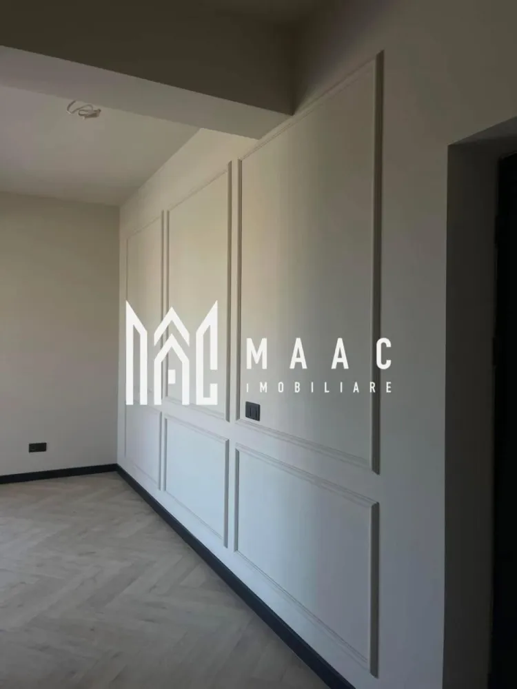 Apartament 3 camere | 71 Mp | Parter ,Boxa | Șelimbăr, zona Brana - MAAC Imobiliare vă prezintă un apartament situat în ansamblul rezidențial Casian Renaissance – Șelimbăr, zona Brana, la doar câteva minute de centrul comercial Shopping City Sibiu.

Acces facil din Sibiu prin trei artere principale:

Strada Ștefan cel Mare
Strada Octavian Goga (Șelimbăr)
Strada P. Brana

Toate căile de acces sunt asfaltate, oferind confort și conectivitate optimă.

Despre Casian Renaissance
Casian Renaissance este un proiect rezidențial premium, gândit pentru cei care caută calitate, eleganță și un stil de viață modern. Proiectul include:

6 imobile P+3 dotate cu lifturi moderne

256 de unități locative: garsoniere, apartamente cu 2 și 3 camere

Caracteristici ale ansamblului:
✔ Design arhitectural deosebit – fațade placate cu profile ornamentale, interior și exterior
✔ Lifturi performante în fiecare bloc
✔ Loc de joacă amenajat pentru copii
✔ Alei de promenadă și spații verzi generoase
✔ Locuri de parcare amenajate și căi de acces asfaltate
✔ Iluminat stradal

Casian Renaissance înseamnă siguranță, bun gust, calitate premium și confort garantat.
Este un loc creat pentru cei care își doresc ceva cu adevărat unic și deosebit.

📞 Pentru mai multe detalii sau pentru a programa o vizionare, contactați-ne cu încredere specificand ID:CP2609840