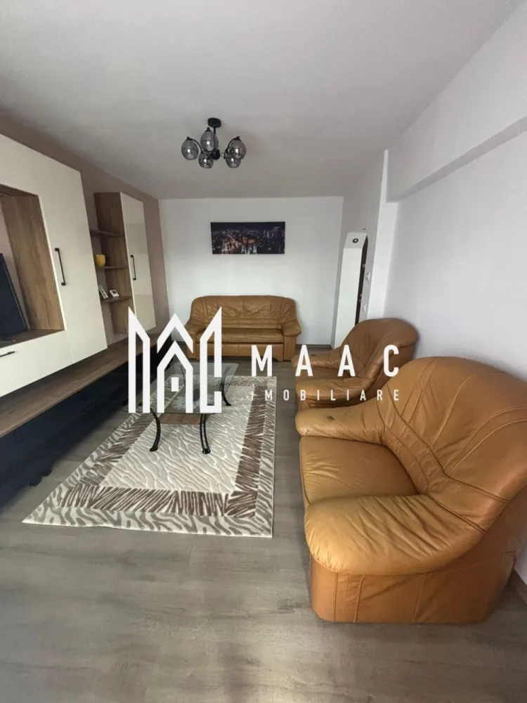 Apartament 2 camere | Decomandat | Etaj 2 | Balcon | Pivniță | Ștrand - Maac Imobiliare prezintă un apartament spațios și complet decomandat, situat la etajul 2 din 4 al unui bloc bine întreținut din cartierul Ștrand. Locuința dispune de o suprafață totală de 71 mp, din care 61 mp utili și balcon generos de 10 mp, perfect pentru momentele de relaxare. Apartamentul a fost renovat recent, inclusiv instalația electrică și cea termică, oferind un confort modern și siguranță. Este compus din două camere mari, bucătărie separată, baie cu geam, hol spațios și balcon închis. Se vinde mobilat și utilat complet, exact ca în fotografii – gata de mutat! Beneficiază de o pivniță mare, ideală pentru depozitare suplimentară, și se află într-o zonă foarte bine dezvoltată, cu acces facil către: stații de autobuz, școli și grădinițe, magazine și farmacii, parc și alte facilități de cartier. Ideal pentru locuit sau investiție! Pentru mai multe detalii specificati ca ati vazut anuntul cu ID: CP2539690