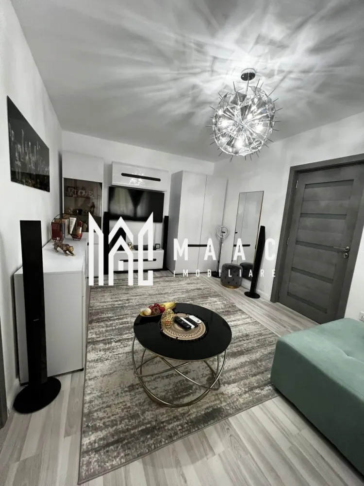 Apartament 2 camere | Renovat | Etaj 2 | Balcon | Milea - MAAC Imobiliare va prezinta un apartament 2 camere semidecomandat, complet mobilat și utilat – Zona Milea / Vasile Aaron.

Caracteristici generale:
Suprafață utilă: 44 mp
Etaj: 2 din 4 – etaj intermediar
Compartimentare: semidecomandată – spațiu optimizat, bine gândit
Balcon spațios, închis cu geamuri termopan
Apartamentul se predă complet mobilat și utilat, conform fotografiilor

Compartimentare:
Apartamentul este format din hol de intrare, sufragerie, dormitor, bucătărie, baie cu geam de aerisire și un balcon închis cu termopan.

Dotări și îmbunătățiri recente:
Instalații noi pentru gaz, curent și apă
Centrală termică proprie nouă cu calorifere
Izolație termică exterioară pentru un plus de eficiență energetică
Geamuri termopan
Ușă metalică la intrare
Șapă autonivelantă pentru podele uniforme
Finisaje: faianță, gresie, parchet și lavabilă

Beneficii:
Apartamentul se vinde complet mobilat și utilat, fiind ideal pentru mutare imediată sau pentru investiție.
Potrivit pentru cupluri, familii mici sau ca investiție pentru închiriere.

Pentru mai multe detalii, precizati telefonic ca ati vazut anuntul cu ID: CP2538776
