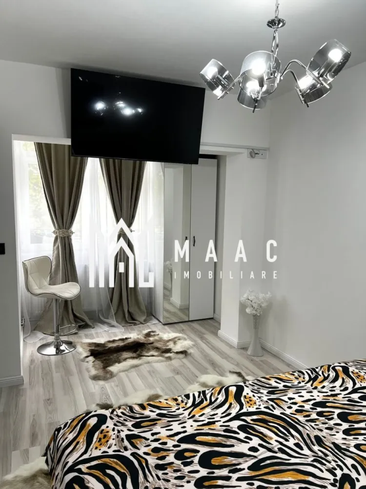Apartament 2 camere | Renovat | Etaj 2 | Balcon | Milea - MAAC Imobiliare va prezinta un apartament 2 camere semidecomandat, complet mobilat și utilat – Zona Milea / Vasile Aaron.

Caracteristici generale:
Suprafață utilă: 44 mp
Etaj: 2 din 4 – etaj intermediar
Compartimentare: semidecomandată – spațiu optimizat, bine gândit
Balcon spațios, închis cu geamuri termopan
Apartamentul se predă complet mobilat și utilat, conform fotografiilor

Compartimentare:
Apartamentul este format din hol de intrare, sufragerie, dormitor, bucătărie, baie cu geam de aerisire și un balcon închis cu termopan.

Dotări și îmbunătățiri recente:
Instalații noi pentru gaz, curent și apă
Centrală termică proprie nouă cu calorifere
Izolație termică exterioară pentru un plus de eficiență energetică
Geamuri termopan
Ușă metalică la intrare
Șapă autonivelantă pentru podele uniforme
Finisaje: faianță, gresie, parchet și lavabilă

Beneficii:
Apartamentul se vinde complet mobilat și utilat, fiind ideal pentru mutare imediată sau pentru investiție.
Potrivit pentru cupluri, familii mici sau ca investiție pentru închiriere.

Pentru mai multe detalii, precizati telefonic ca ati vazut anuntul cu ID: CP2538776