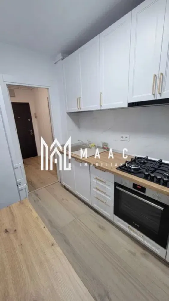 Apartameent 2 camere | Etaj 1 | Balcon Inchis | Mihai Viteazu - MAAC Imobiliare vă propune spre închiriere un apartament cu 2 camere, situat în zona Mihai Viteazu , la etajul 1 din 9, într-un bloc îngrijit.

Locuința are o suprafață de 60 mp și a fost recent modernizată.

Compartimentare:
Living spațios
Dormitor
Bucătărie separată
Baie modernă
Dotări și beneficii:
Complet mobilat modern
Bucătărie complet utilată cu electrocasnice noi:
frigider mare
mașină de spălat vase
cuptor electric
plită
hotă
Centrală termică proprie
Mașină de spălat rufe
Baie modernă cu duș walk-in
Bloc îngrijit
Etaj 1 – acces facil

Pentru mai multe detalii sau programarea unei vizionări, nu ezitați să ne contactați specificand ID: CP3061392