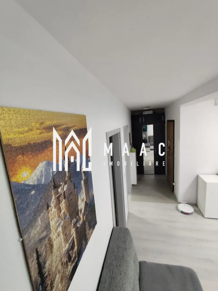 Apartament 3 camere | Etaj 2 | 2 Balcoane | Calea Surii Mici - MAAC Imobiliare vă propune spre vânzare un apartament cu 3 camere, situat într-o zonă liniștită și în plină dezvoltare – Calea Șurii Mici, în ansamblul rezidențial Kastani Residence, Sibiu.

Etaj: 2/3
Suprafață utilă: 55 mp
2 balcoane: 3 mp și 7 mp
Loc de parcare privat inclus
Complet mobilat și utilat

Proprietatea este ideală atât pentru locuit, cât și ca investiție, fiind atent compartimentată pentru confort și funcționalitate. Se vinde așa cum se prezintă în fotografii – cu mobilier de calitate și electrocasnice incluse.

Avantaje:

Compartimentare eficientă: living cu bucătărie open space, 2 dormitoare, baie, 2 balcoane

Loc de parcare inclus în preț

Etaj intermediar (2/3) – confort termic sporit

Ansamblu rezidențial modern, cu acces facil către zona industrială vest, autostradă și Aeroport

Nu rata ocazia de a locui într-un apartament cochet, într-o zonă în continuă dezvoltare!
Pentru mai multe informații sau pentru programarea unei vizionări, echipa MAAC Imobiliare este aici pentru tine! ID: CP2491398.