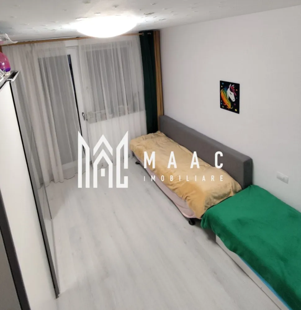 Apartament 3 camere | Etaj 2 | 2 Balcoane | Calea Surii Mici - MAAC Imobiliare vă propune spre vânzare un apartament cu 3 camere, situat într-o zonă liniștită și în plină dezvoltare – Calea Șurii Mici, în ansamblul rezidențial Kastani Residence, Sibiu.

Etaj: 2/3
Suprafață utilă: 55 mp
2 balcoane: 3 mp și 7 mp
Loc de parcare privat inclus
Complet mobilat și utilat

Proprietatea este ideală atât pentru locuit, cât și ca investiție, fiind atent compartimentată pentru confort și funcționalitate. Se vinde așa cum se prezintă în fotografii – cu mobilier de calitate și electrocasnice incluse.

Avantaje:

Compartimentare eficientă: living cu bucătărie open space, 2 dormitoare, baie, 2 balcoane

Loc de parcare inclus în preț

Etaj intermediar (2/3) – confort termic sporit

Ansamblu rezidențial modern, cu acces facil către zona industrială vest, autostradă și Aeroport

Nu rata ocazia de a locui într-un apartament cochet, într-o zonă în continuă dezvoltare!
Pentru mai multe informații sau pentru programarea unei vizionări, echipa MAAC Imobiliare este aici pentru tine! ID: CP2491398.