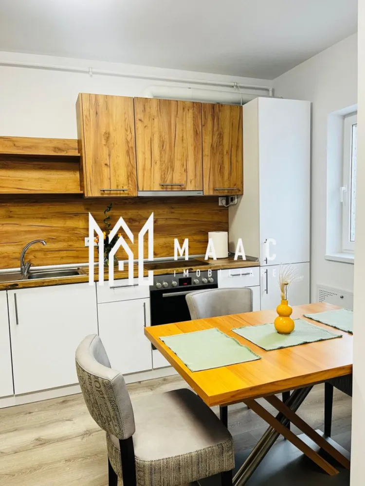 Apartament 2 camere | 54 MPU | Turnisor\Neppendorf - MAAC Imobiliare vă propune spre închiriere un apartament modern, luminos și bine compartimentat, situat într-un imobil nou din zona Neppendorf, Sibiu. Proprietatea este ideală pentru un cuplu sau o persoană activă, oferind confort, funcționalitate și acces facil atât către centrul orașului, cât și către autostradă.

Compartimentare:
living generos open space cu bucătărie
dormitor confortabil
baie spațioasă
hol de intrare
balcon cu acces din living

Dotări și avantaje:
apartament complet mobilat și utilat
mașină de spălat rufe
mașină de spălat vase
frigider
cuptor electric
plită electrică
televizor
Wi-Fi
încălzire în pardoseală
clasă energetică A
loc de parcare inclus
imobil dotat cu lift

Suprafață:
54 mp + balcon

Localizare:
Neppendorf, Sibiu – zonă liniștită, cu acces facil către principalele puncte de interes ale orașului

Condiții de închiriere:
preț: 490 €/lună
garanție: echivalentul unei chirii lunare
disponibilitate: 1 iunie

Pentru mai multe detalii sau pentru programarea unei vizionări, vă rugăm să ne contactați specificând: ID: CP3070129