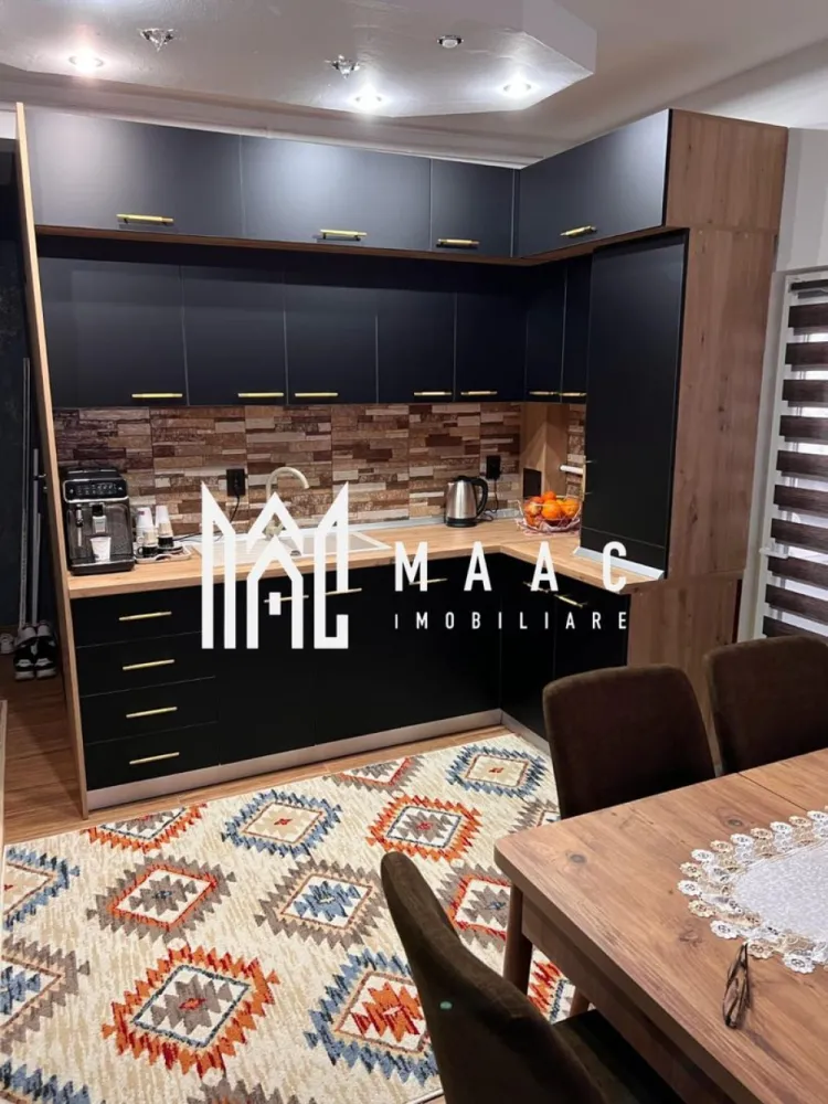 Apartament 3 Camere | 55 MPU | Renovat Recent | Hipodrom 2 - MAAC Imobiliare va prezinta un apartament complet renovat, situat în orașul Sibiu, cartierul Hipodrom 2. Apartamentul are o suprafață utilă de 54 mp și un balcon închis de 3,8 metri lungime.
 Este compus din două dormitoare decomandate, un living open space, o baie complet renovată și o bucătărie pe balcon.

Specificații și dotări:

Renovare completă: Gresie, faianță, sanitare, robineți noi.
Centrala termică: Nouă, marca Ariston.
Instalația electrică: Refăcută complet, inclusiv doze, prize, întrerupătoare etc.

Balcon închis: Termopan complet, cu acoperiș nou.
Ferestre: Schimbate, cu pervaz interior și exterior, uși interioare noi
Pardoseală: Parchet în camere și gresie în living.
Bucătărie pe balcon: Mobilier făcut pe comandă, electrocasnice noi (aragaz, hotă, frigider, mașină de spălat, uscător, espressor de cafea, televizor Smart).
Apartamentul se vinde complet mobilat, cu toate electrocasnicele noi și garanțiile acestora.

Facilități în apropiere:

Grădiniță la 10 metri.
Școală la 100 de metri.
Supermarket PROFI la 100 de metri.
Clinica Medicală la 200 de metri.
Lidl, Dedeman, Mega Image, Piața.
Stații de autobuz în apropiere.

Pentru mai multe detalii precizati telefonic ca ati vazut anuntul cu ID : CP2285885