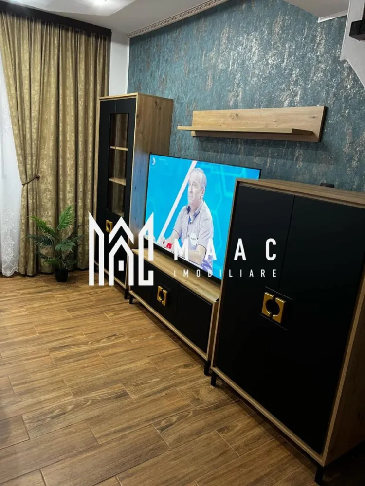 Apartament 3 Camere | 55 MPU | Renovat Recent | Hipodrom 2 - MAAC Imobiliare va prezinta un apartament complet renovat, situat în orașul Sibiu, cartierul Hipodrom 2. Apartamentul are o suprafață utilă de 54 mp și un balcon închis de 3,8 metri lungime.
 Este compus din două dormitoare decomandate, un living open space, o baie complet renovată și o bucătărie pe balcon.

Specificații și dotări:

Renovare completă: Gresie, faianță, sanitare, robineți noi.
Centrala termică: Nouă, marca Ariston.
Instalația electrică: Refăcută complet, inclusiv doze, prize, întrerupătoare etc.

Balcon închis: Termopan complet, cu acoperiș nou.
Ferestre: Schimbate, cu pervaz interior și exterior, uși interioare noi
Pardoseală: Parchet în camere și gresie în living.
Bucătărie pe balcon: Mobilier făcut pe comandă, electrocasnice noi (aragaz, hotă, frigider, mașină de spălat, uscător, espressor de cafea, televizor Smart).
Apartamentul se vinde complet mobilat, cu toate electrocasnicele noi și garanțiile acestora.

Facilități în apropiere:

Grădiniță la 10 metri.
Școală la 100 de metri.
Supermarket PROFI la 100 de metri.
Clinica Medicală la 200 de metri.
Lidl, Dedeman, Mega Image, Piața.
Stații de autobuz în apropiere.

Pentru mai multe detalii precizati telefonic ca ati vazut anuntul cu ID : CP2285885