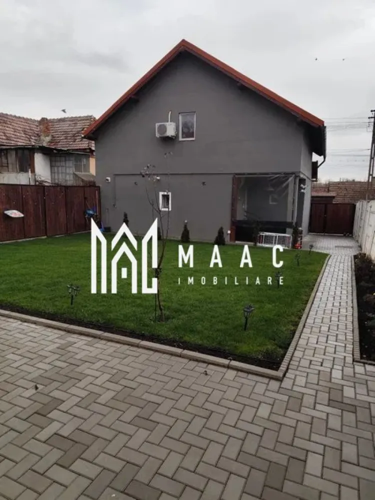 Casa individuala | 5 Camere | Sura Mare - MAAC Imobiliare vă propune spre vânzare o casă individuală amenajată la cheie, situată în localitatea Șura Mare, ideală pentru o familie care își dorește confort, spațiu generos și o locuință complet pregătită pentru mutare. Proprietatea beneficiază de compartimentare eficientă, suprafețe generoase și toate utilitățile necesare unui stil de viață modern.

Imobilul este construit pe un teren cu suprafața de 475 mp, are regim de înălțime P+M și o suprafață utilă de 189 mp, fiind compartimentat astfel încât să ofere funcționalitate și confort pentru întreaga familie.

La parter se află un living open space cu bucătărie, spațiu luminos și primitor, ideal pentru petrecerea timpului alături de familie și prieteni. Tot la acest nivel se regăsesc un dormitor, o baie și o cămară practică pentru depozitare suplimentară.

Etajul este compartimentat într-un mod eficient și cuprinde hol de acces, 3 dormitoare spațioase, 2 dressing-uri generoase și o baie prevăzută cu geam de aerisire, oferind lumină naturală și confort sporit.

Casa este izolată termic și se predă mobilată și utilată, conform fotografiilor de prezentare, fiind pregătită pentru mutare imediată fără investiții suplimentare.

Compartimentare:
-Living open space cu bucătărie
-4 dormitoare
-2 băi
-2 dressing-uri
-Cămară
-Hol acces

Caracteristici și dotări:
-Suprafață utilă de 189 mp
-Teren de 475 mp
-Regim de înălțime P+M
-Curte liberă de 286 mp
-Casă amenajată la cheie
-Mobilată și utilată
-Aer condiționat
-Curent electric
-Apă
-Gaz
-Cablu TV
-Fibră optică
-Izolație termică

Proprietatea reprezintă o alegere excelentă pentru cei care caută o casă individuală de vânzare în Șura Mare, într-o zonă liniștită și accesibilă, cu spații generoase atât la interior, cât și la exterior.

Pentru mai multe informații și programarea unei vizionări, vă rugăm să contactați echipa MAAC Imobiliare și să menționați CP2280868 la telefon.