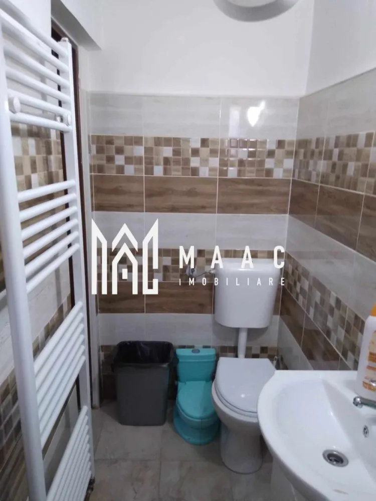 Apartament La Casă | Bucătărie Separată | Piața Cluj - MAAC Imobiliare prezintă un apartament la casă, situat în zona Piața Cluj, ideal pentru cei care caută un spațiu liniștit, cu acces la o curte comună.

Proprietatea dispune de:

Suprafață utilă: 49 mp, 3 camere, bucătărie separată și baie;
Curte comună: Perfectă pentru relaxare sau diverse activități în aer liber, împărțită cu alți vecini;
Compartimentare: Spațiu eficient organizat pentru confortul locatarilor;
Stare interioară: Apartamentul este bine întreținut și poate fi personalizat după preferințe;
Acces facil: Aproape de Piața Cluj, cu acces rapid la magazine, școli și mijloace de transport.

Pentru mai multe detalii sau pentru a programa o vizionare, nu ezitați să ne contactați! ID CP2266956