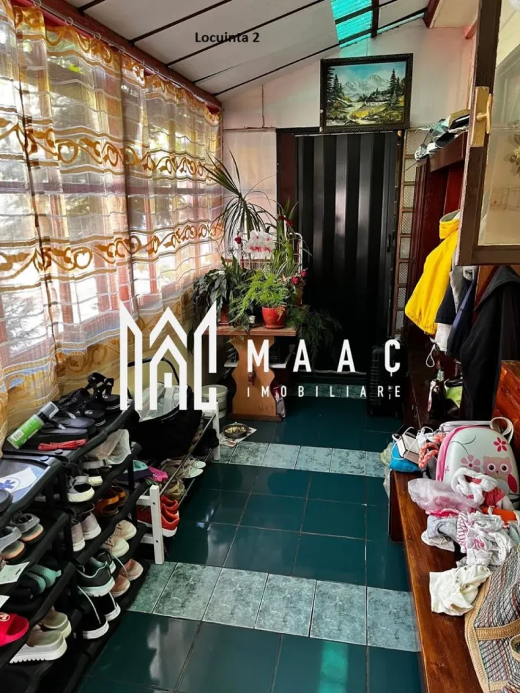 Casa individuala | Teren 510 mp | Cisnadie - MAAC Imobiliare va propune spre vanzare o casa individuala,situata in zona centrala a orasului Cisnadie.

Detalii generale:

Suprafață teren: 510 mp
Suprafata utila: 176 mp
Garaj: 60 mp
Curte: 128 mp
Grădină de 147 mp și fântână proprie.

Aceasta casa este ideală atat pentru locuință cat și pentru afacere (spațiu comercial, after-school, loc de joacă).
Dispune de incalzire in pardoseala, avand centrala proprie.
Acoperisul a fost recent renovat cu țiglă nouă.

Locuința 1:
Configurație: Pivniță + Parter + Mansardă.
Pivniță: 16,86 mp.
Parter: 82,42 mp (Hol, cămară, debara, bucătărie, baie, living – parțial amenajate).
Etaj/Mansardă: 92,76 mp neamenajați (plan existent pentru 3 dormitoare, fiecare cu dressing și o baie).
Utilități: Branșamente separate (gaz, apă, curent).

Locuința 2:
Configurație: Parter.
2 dormitoare: 16,7 mp fiecare.
Living open-space cu bucătărie: 23 mp.
Cămară: 7 mp.
Baie: 8 mp.
Birou: cameră separată.
Verandă.
Spații anexe:
Garaj: 59 mp – clădire separată.
Curte: 128 mp – împărțită cu o altă persoană.
Grădină: 147 mp – ideală pentru relaxare sau amenajări personalizate.

Pentru mai multe detalii sau pentru a programa o vizionare va rugam sepcificati telefonic ID: CP2247889