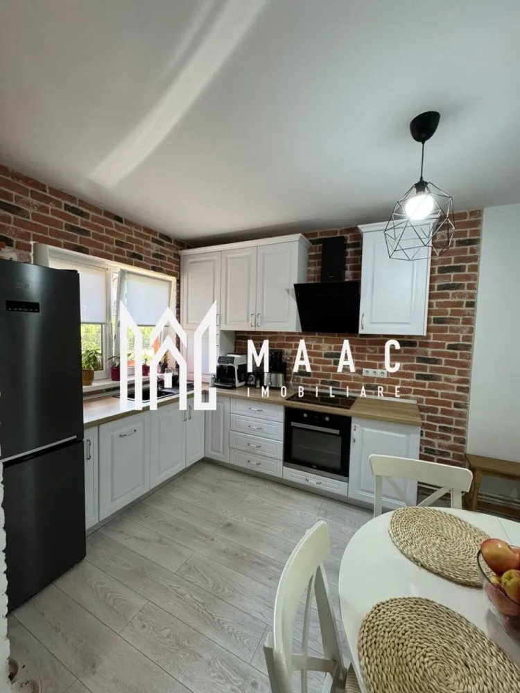 Casa individuala | Teren | Zona Sura Mare - MAAC Imobiliare vă propune spre vânzare o casă tip duplex situată într-un cartier rezidențial din Șura Mare, într-o zonă liniștită, potrivită pentru familie, cu acces facil către oraș. Proprietatea beneficiază de un teren total de 265 mp, dintre care 215 mp reprezintă teren liber, oferind spațiu generos pentru curte și amenajări exterioare. Locuința are regim de înălțime P+M și este compartimentată eficient, cu delimitare clară între zona de zi și zona de noapte. Compartimentare: -Parter: bucătărie open space, baie de serviciu complet mobilată și utilată, spațiu de depozitare închis tip dressing, living spațios cu acces direct în curtea interioară -Etaj: două dormitoare matrimoniale spațioase, fiecare cu balcon individual, baie complet mobilată și utilată Ambele băi sunt prevăzute cu geam de aerisire, una fiind dotată cu cabină de duș, iar cealaltă cu cadă. Proprietatea dispune de o grădină spațioasă de 215 mp, carport pentru mașină și spațiu de depozitare extern, oferind funcționalitate și confort pentru locuire permanentă. Pentru mai multe detalii precizați telefonic că ați văzut anunțul cu CP2137299.