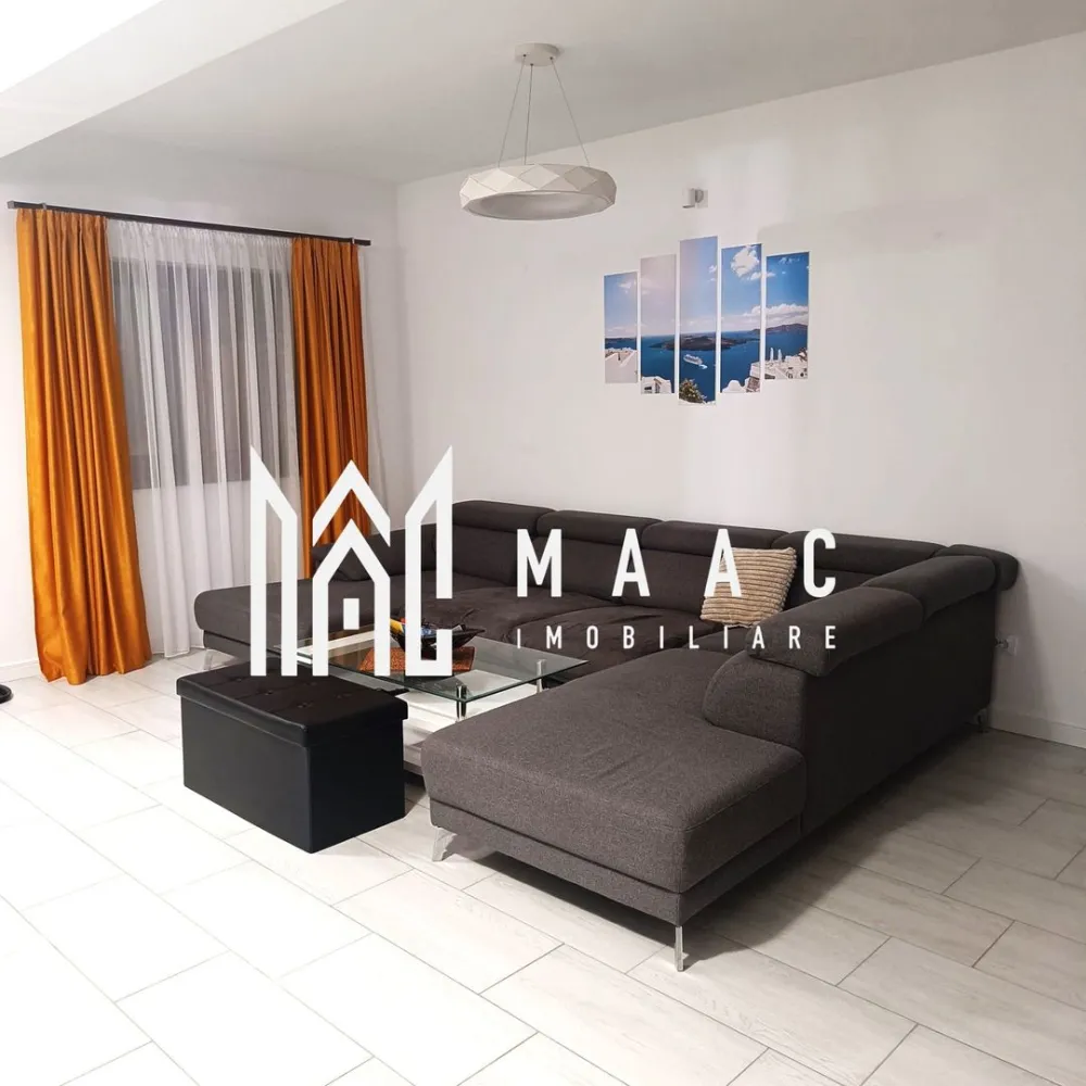 Casa 4 camere | Curte proprie | Panouri solare | Sura Mica - MAAC Imobiliare vă propune spre vânzare un duplex situat în Șura Mică, într-o zonă rezidențială apreciată pentru liniște și acces facil către oraș. Proprietatea a fost construită în anul 2021 și este amplasată pe un teren de 200 mp, având o suprafață utilă totală de 115 mp, distribuită pe două niveluri, câte 57,5 mp pe fiecare etaj.

Locuința este eficient compartimentată, cu parter open space și zonă de noapte bine delimitată la etaj, oferind confort și funcționalitate pentru o familie.

Compartimentare:
-Parter: living generos cu șemineu, spațiu de servit masa (dining), bucătărie cu insulă complet utilată, cămară, baie cu cabină de duș și geam de aerisire
-Etaj: 2 dormitoare fiecare cu balcon propriu, 1 dormitor amenajat ca office space, baie cu geam de aerisire și cadă, debara

Exteriorul este amenajat pentru relaxare și activități în aer liber, incluzând terasă mobilată la parter, spațiu de parcare pentru 2 mașini, grătar generos din fier cu spațiu de lucru, jacuzzi , wellnese spa și pivniță.

Casa este racordată la toate utilitățile și se vinde complet mobilată și utilată, incluzând electrocasnice precum aragaz, aspirator, cafetieră, cuptor cu microunde, fier de călcat, frigider, hotă, mașină de spălat rufe, mașină de spălat vase, robot de bucătărie, sandwich-maker, toaster și TV. Proprietatea beneficiază de panouri solare de 3 kW montate în 2024.

Pentru mai multe detalii precizați telefonic că ați văzut anunțul cu CP2103454.