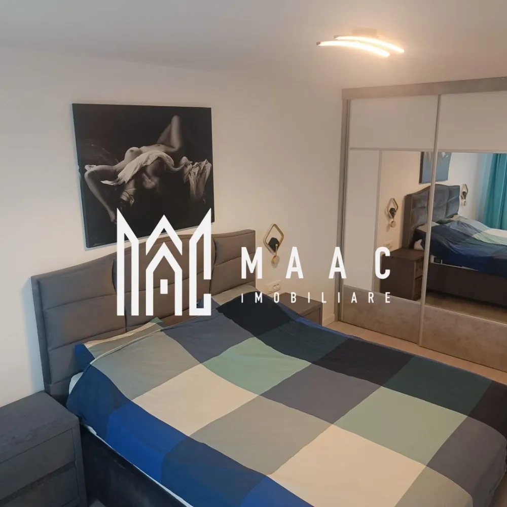 Casa 4 camere | Curte proprie | Panouri solare | Sura Mica - MAAC Imobiliare vă propune spre vânzare un duplex situat în Șura Mică, într-o zonă rezidențială apreciată pentru liniște și acces facil către oraș. Proprietatea a fost construită în anul 2021 și este amplasată pe un teren de 200 mp, având o suprafață utilă totală de 115 mp, distribuită pe două niveluri, câte 57,5 mp pe fiecare etaj.

Locuința este eficient compartimentată, cu parter open space și zonă de noapte bine delimitată la etaj, oferind confort și funcționalitate pentru o familie.

Compartimentare:
-Parter: living generos cu șemineu, spațiu de servit masa (dining), bucătărie cu insulă complet utilată, cămară, baie cu cabină de duș și geam de aerisire
-Etaj: 2 dormitoare fiecare cu balcon propriu, 1 dormitor amenajat ca office space, baie cu geam de aerisire și cadă, debara

Exteriorul este amenajat pentru relaxare și activități în aer liber, incluzând terasă mobilată la parter, spațiu de parcare pentru 2 mașini, grătar generos din fier cu spațiu de lucru, jacuzzi , wellnese spa și pivniță.

Casa este racordată la toate utilitățile și se vinde complet mobilată și utilată, incluzând electrocasnice precum aragaz, aspirator, cafetieră, cuptor cu microunde, fier de călcat, frigider, hotă, mașină de spălat rufe, mașină de spălat vase, robot de bucătărie, sandwich-maker, toaster și TV. Proprietatea beneficiază de panouri solare de 3 kW montate în 2024.

Pentru mai multe detalii precizați telefonic că ați văzut anunțul cu CP2103454.