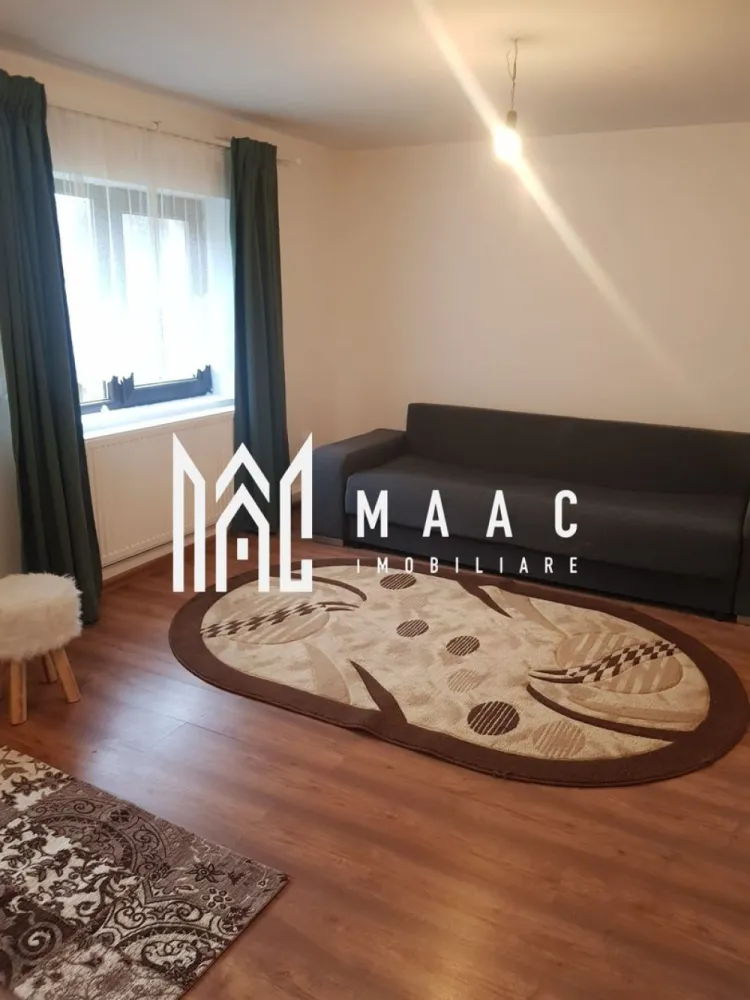 Casa 4 Camere | 600 MP Teren | Avrig - MAAC Imobiliare vă propune spre vânzare o casă de vacanță amplasată pe strada principală din Valea Avrigului, oferind un spațiu generos și multiple facilități pentru confortul dumneavoastră.

Detalii proprietate:

Suprafață utila: 142 mp
Compartimentare:
Parter: living spațios, bucătărie complet utilată, baie, pivniță
Etaj: 3 camere, 2 băi, hol, acces prin scări interioare și exterioare
Teren: 600 mp (posibil extindere la 1100 mp)
Dotări și facilități:

Apă din foraj de 65 m
Curent electric, inclusiv panouri solare
Încălzire cu termosemineu pe lemne, calorifere și boiler de 120 L
2 foișoare ideale pentru relaxare
Magazii pentru depozitarea lemnelor
Această proprietate este perfectă pentru cei care doresc să evadeze din agitația urbană și să se bucure de natură. Pentru mai multe informații și pentru a programa o vizionare, vă rugăm să ne contactați ID:CP2089927