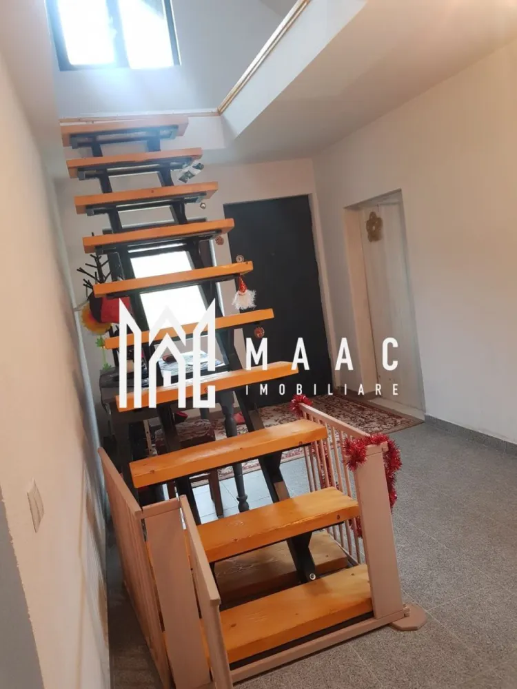 Casa 4 Camere | 600 MP Teren | Avrig - MAAC Imobiliare vă propune spre vânzare o casă de vacanță amplasată pe strada principală din Valea Avrigului, oferind un spațiu generos și multiple facilități pentru confortul dumneavoastră.

Detalii proprietate:

Suprafață utila: 142 mp
Compartimentare:
Parter: living spațios, bucătărie complet utilată, baie, pivniță
Etaj: 3 camere, 2 băi, hol, acces prin scări interioare și exterioare
Teren: 600 mp (posibil extindere la 1100 mp)
Dotări și facilități:

Apă din foraj de 65 m
Curent electric, inclusiv panouri solare
Încălzire cu termosemineu pe lemne, calorifere și boiler de 120 L
2 foișoare ideale pentru relaxare
Magazii pentru depozitarea lemnelor
Această proprietate este perfectă pentru cei care doresc să evadeze din agitația urbană și să se bucure de natură. Pentru mai multe informații și pentru a programa o vizionare, vă rugăm să ne contactați ID:CP2089927