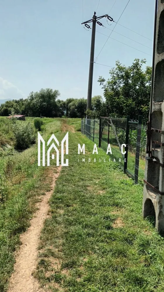 Vand teren intravilan | 1.638 mp | Bungard - MAAC Imobiliare vă oferă spre vânzare un teren intravilan situat în satul Bungard, județul Sibiu.

Detalii Teren:

Suprafață: 1638 mp
Deschidere: 27 m
Utilități:

Apă, gaz și canalizare la 50 de metri
Avantaje:

Terenul se poate parcela, oferind flexibilitate pentru diverse proiecte
Pentru mai multe detalii și pentru a programa o vizionare, vă rugăm să ne contactați precizând ID: CP2086407