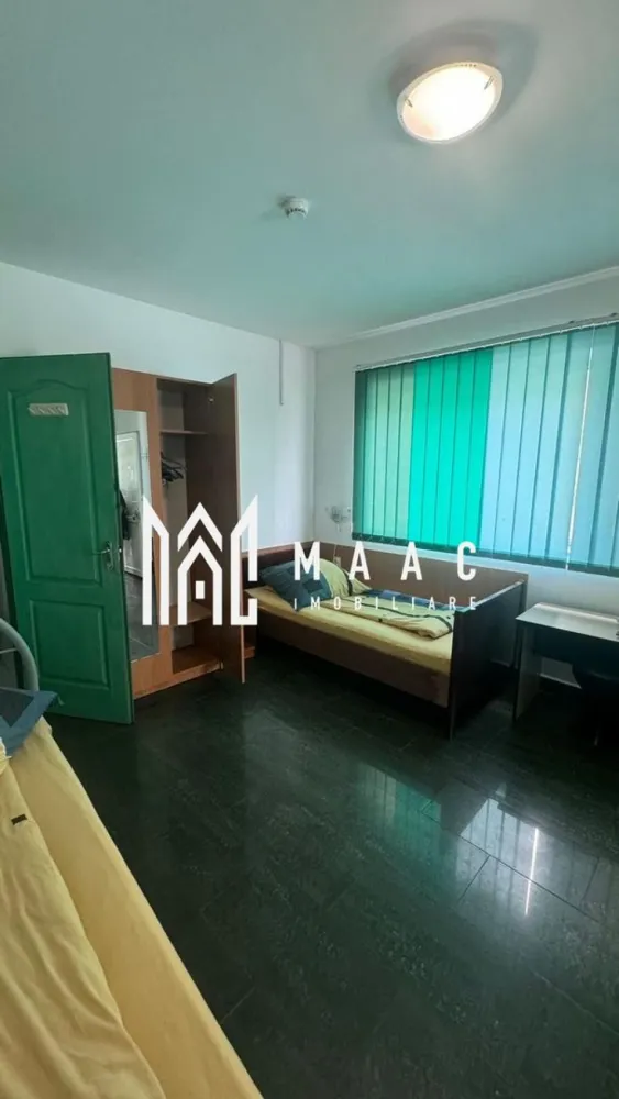 Pensiune la cheie | 229mpu/ nivel | 7 minute de centru sibiului - MAAC Imobiliare va oferă spre vanzare o pensiune complet utilata.
Localizare: Sibiu

Caracteristici și Dotări:
Camere: 13 camere, fiecare cu baie proprie

Spații comune:
Bucătărie complet echipată
Recepție/Bar pentru primirea oaspeților
Terasă spațioasă pentru relaxare
Birou/Oficiu: Spațiu dedicat pentru activitățile administrative

Avantaje și Facilități:
Confort: Fiecare cameră este dotată cu toate necesitățile pentru a oferi un sejur plăcut oaspeților
Utilități: Pensiunea este echipată cu toate utilitățile necesare pentru funcționare, inclusiv 2 centrale proprii
Siguranță: Scară de incendiu și autorizație ISU
Design: Interior modern și funcțional, potrivit pentru o experiență turistică de calitate

Oportunitate de Investiție:
Profitabilitate: Ideală pentru investiție în domeniul turismului, având potențial ridicat datorită numărului mare de camere și facilităților oferite
Localizare: Situată într-o zonă atractivă din Sibiu, care atrage turiști pe tot parcursul anului

Pentru mai multe informații sau pentru a programa o vizionare, nu ezitați să ne contactați, specificand ID: CP2083185