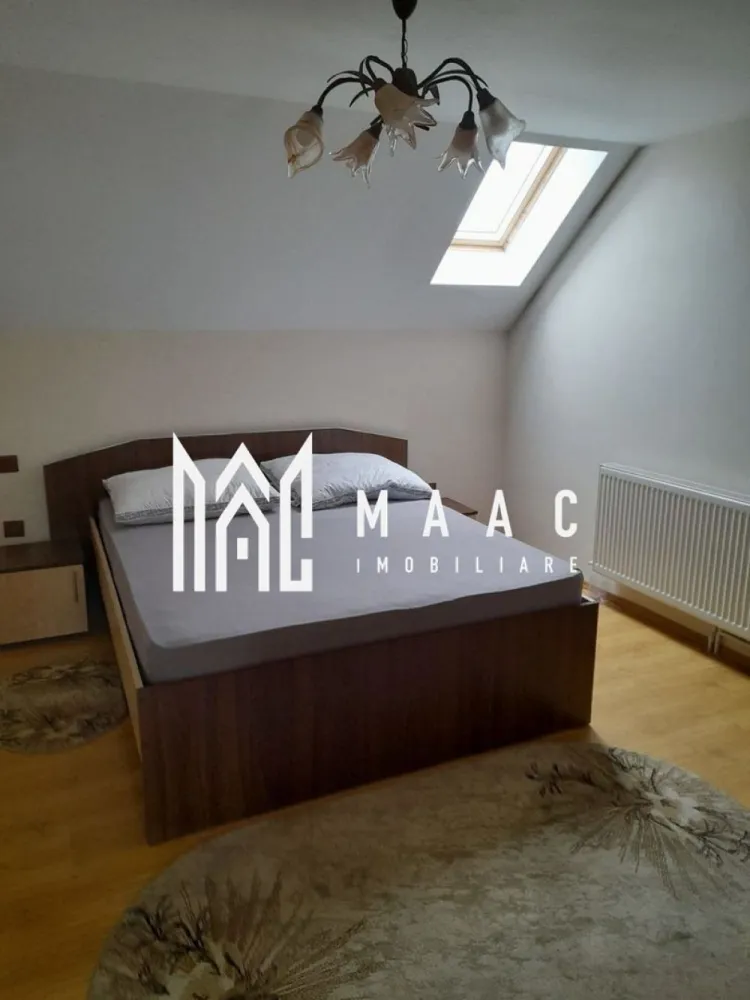 Casa individuala | 7 camere | Alma, Judetul Sibiu - MAAC Imobiliare vă propune spre vanzare o casa cu 7 camere, amplasată în comuna Alma, într-o zonă liniștită și plină de farmec.
Construită în 2013, această proprietate este ideală pentru cei care caută un cămin confortabil, bine compartimentat.

Cu regim de inaltime S+P+M, proprietatea are o pivnita racoroasa si un bar amenajat la subsol; la parter (115mp) gasim un garaj spatios, cu acces in casa, hol, living cu semineu, bucatarie moderna, dormitor si 2 bai (una mare, cu dus si cada, alta de serviciu); mansarda (90 mp)-3 dormitoare, hol, baie cu dus, balcon, acces la pod, terasa acoperita.

In curte-anexă care include: bucătărie de vară, atelier, copertină pentru lemne.

Dotari: curent trifazic, centrală termică pe gaz, semineu, panou solar pentru apă caldă menajeră, geamuri termopan cu rulouri, apă curentă și canalizare, conectate la rețeaua locală.
Grădina generoasă, de 800 m², e amenajată cu pomi fructiferi și viță de vie.
Fântână.

Fie că te bucuri de grădina generoasă, de spațiile interioare bine gândite sau de liniștea zonei, acest loc te va face să te simți "acasă" încă de la prima vizită.

Proprietatea se vinde complet mobilată.

Pentru mai multe informații și pentru a programa o vizionare, ne poți contacta chiar acum! Nu uita să specifici ID-ul anunțului: CP2066511