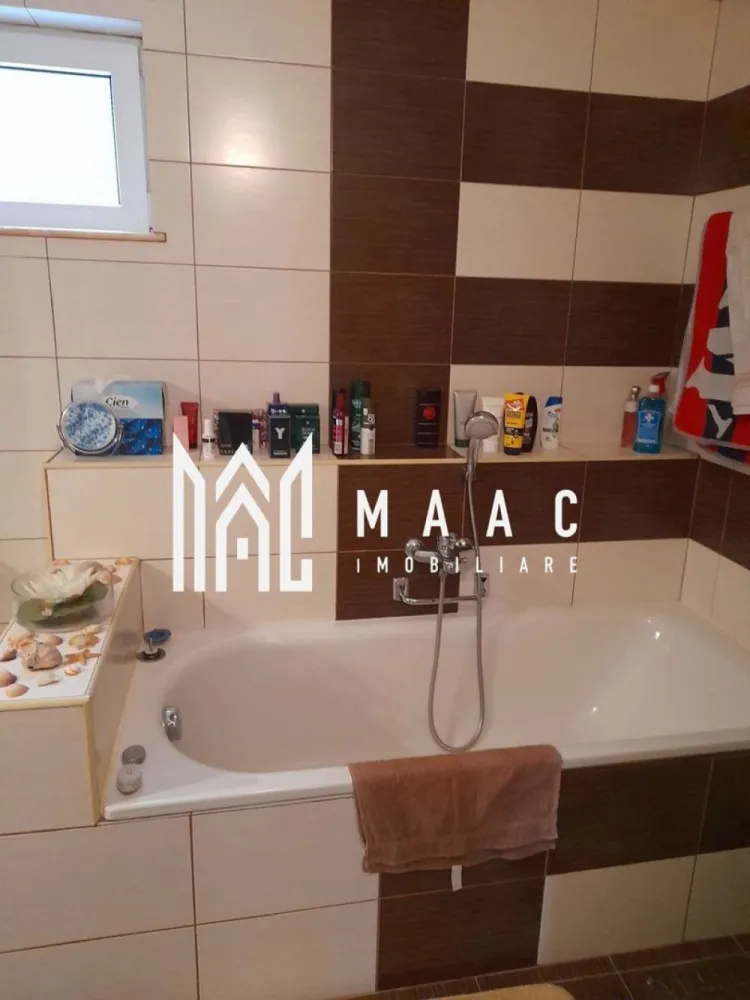 Casa individuala | 7 camere | Alma, Judetul Sibiu - MAAC Imobiliare vă propune spre vanzare o casa cu 7 camere, amplasată în comuna Alma, într-o zonă liniștită și plină de farmec.
Construită în 2013, această proprietate este ideală pentru cei care caută un cămin confortabil, bine compartimentat.

Cu regim de inaltime S+P+M, proprietatea are o pivnita racoroasa si un bar amenajat la subsol; la parter (115mp) gasim un garaj spatios, cu acces in casa, hol, living cu semineu, bucatarie moderna, dormitor si 2 bai (una mare, cu dus si cada, alta de serviciu); mansarda (90 mp)-3 dormitoare, hol, baie cu dus, balcon, acces la pod, terasa acoperita.

In curte-anexă care include: bucătărie de vară, atelier, copertină pentru lemne.

Dotari: curent trifazic, centrală termică pe gaz, semineu, panou solar pentru apă caldă menajeră, geamuri termopan cu rulouri, apă curentă și canalizare, conectate la rețeaua locală.
Grădina generoasă, de 800 m², e amenajată cu pomi fructiferi și viță de vie.
Fântână.

Fie că te bucuri de grădina generoasă, de spațiile interioare bine gândite sau de liniștea zonei, acest loc te va face să te simți "acasă" încă de la prima vizită.

Proprietatea se vinde complet mobilată.

Pentru mai multe informații și pentru a programa o vizionare, ne poți contacta chiar acum! Nu uita să specifici ID-ul anunțului: CP2066511