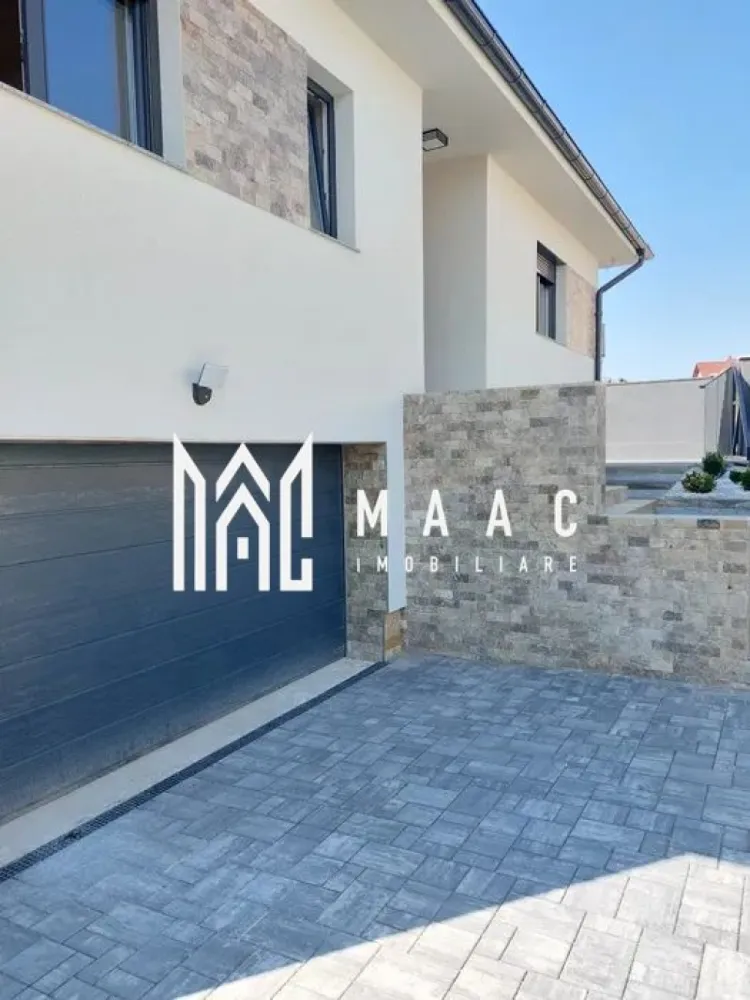 Casa 4 camere | D+P | Garaj | Curte | Pivnita | Selimbar - MAAC imobiliare va prezinta o casa situata in Selimbar formata din Demisol + Parter.

Caracteristici generale:
Suprafața utilă a casei: 160 mp
Structură: Demisol + Parter
Suprafața totală a terenului: 500 mp
Amprenta casei: 180 mp
Teren liber: 276 mp.

Compartimentare:
Demisol:
Cameră tehnică: 17 mp
Pivniță
Garaj: 60 mp

Parter:
3 camere: 18 mp fiecare
Living: 30 mp
Bucătărie: 15 mp
2 băi

Exterior:
Terasa: Situată în spatele casei, ideală pentru momente de relaxare și petrecere a timpului în aer liber

Detalii suplimentare:
Teren liber: 276 mp, oferind un spațiu generos pentru grădină, loc de joacă pentru copii sau alte amenajări exterioare.

Avantaje și beneficii:
Spațiu generos: Suprafața utilă de 160 mp și o compartimentare inteligentă asigură confort și funcționalitate pentru întreaga familie.
Demisol util: Cameră tehnică, pivniță și garaj de 60 mp, oferind spații esențiale pentru depozitare și parcare.
Zonă de zi: Livingul de 30 mp conectat cu bucătăria de 15 mp creează un spațiu deschis.
Camere confortabile: Cele 3 camere de 18 mp fiecare oferă suficient spațiu pentru dormitoare, birouri sau camere pentru oaspeți.
Băi: Două băi la parter, asigurând confort și comoditate.
Teren liber: 276 mp de teren liber oferă multiple posibilități de amenajare exterioară.

Pentru mai multe informații sau pentru a programa o vizionare, nu ezitați să ne contactați, specificand ID CP2058177
