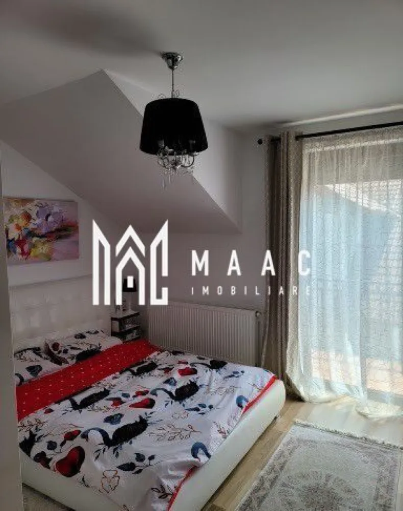 Casa tip Duplex | P+M | 4 camere | 148 MP | Curte | Cisnadie - MAAC Imobiliare va prezinta o casa tip Duplex cu suprafata utila de 148 mp situata in Cisnadie.

Complet mobilată și utilată, situată într-o zonă liniștită în Cisnădie, această proprietate spațioasă, construită în anul 2012, este destinată rezidenței și oferă toate facilitățile necesare pentru un stil de viață modern și confortabil.

Caracteristici:
Suprafață utilă: 148 mp perfect pentru o familie care dorește confort și funcționalitate.

Anul construcției: 2012, realizată cu materiale de calitate și tehnici moderne de construcție, asigurând durabilitate și eficiență energetică.

Încălzire centrală proprie: sistem de încălzire eficient, asigurând confort termic pe tot parcursul anului.

Compartimentare și spații utilitare:
Living spațios: 42 mp ideal pentru momentele de relaxare
Dotat cu șemineu, creând o atmosferă caldă și primitoare.

Dormitoare:
3 dormitoare luminoase, oferind intimitate și confort pentru fiecare membru al familiei.

Băi: 2 băi dotate cu toate facilitățile necesare.

Bucătărie: Complet mobilată și utilată.

Spații utilitare:
Boxă la subsol, debara și WC de serviciu.

Dotări și Finisaje: Casa se vinde complet mobilată.

Scară interioară:
Design modern și funcțional, conectând armonios spațiile de locuit.

Telecomandă poarta acces auto și garaj:
Acces auto facil și securizat, asigurând confortul și siguranța mașinii dumneavoastră.

Amenajare și Facilități Exterioare:
Curte: 100 mp, pavata și amenajată cu plante și arbusti decorativi.

Străzi:
Asfaltate și iluminate stradal, asigurând acces facil și sigur la proprietate.

Pentru mai multe detalii precizati telefonic ca ati vazut anuntul cu ID: CP2043669