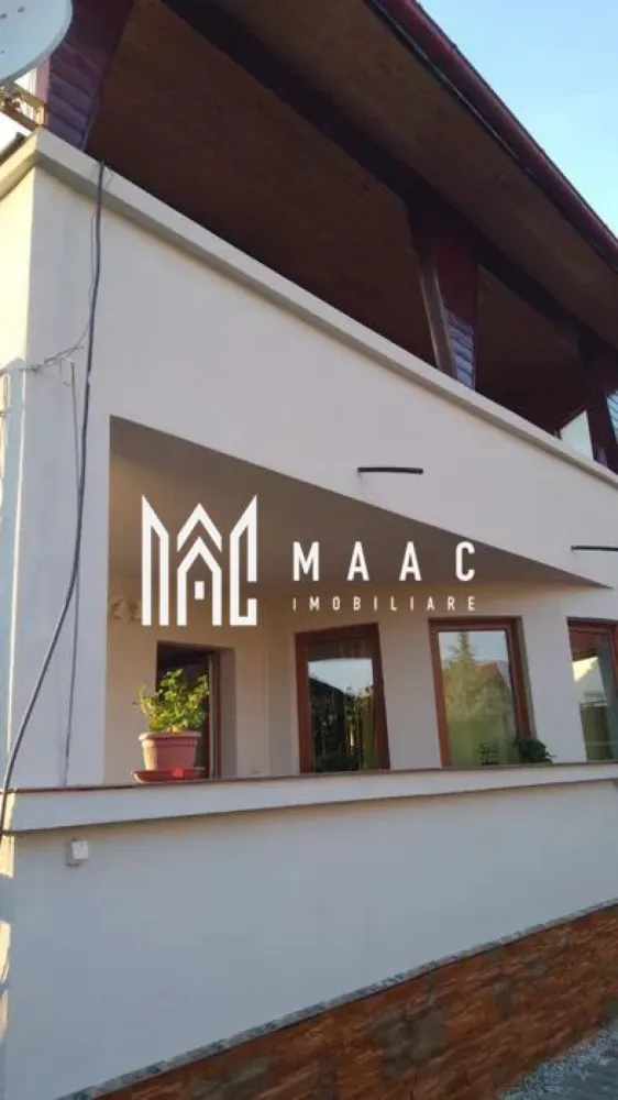 Casa 6 camere | P+2+Pod | 300 MPU | Curte | 680MP | Selimbar - MAAC Imobiliare va prezinta o casa individuala cu 6 camere, curte si gradina situata in zona Selimbar.

Caracteristici:
Parter:
Două intrări separate, oferind acces și posibilitatea de a separa spațiile de locuit.
Două terase generoase, perfecte pentru relaxare în aer liber și socializare.
Living, ideal pentru petrecerea timpului liber.
Bucătărie spațioasă și echipată.
Un dormitor confortabil.
Baie cu duș.
WC de serviciu.
Pivniță pentru depozitare suplimentară.

Etajul 1:
Trei dormitoare luminoase și spațioase, perfecte pentru odihnă și relaxare.
Baie cu cada.
Două terase private, oferind vederi pitorești.

Etajul 2:
Două dormitoare, potrivite pentru membrii familiei sau oaspeții care vizitează.
Baie cu duș, asigurând confort și comoditate.
Living luminos.
Birou, oferind un spațiu dedicat pentru lucru sau studiu.

Exterior:
Curte:
Două intrări separate, pentru acces facil.
Zonă pavată, ușor de întreținut și ideală pentru petrecerea timpului în aer liber.
Zonă de grătar.
Filigorie, oferind umbră plăcută în zilele călduroase de vară.
Grădină îngrijită de 300mp, cu potențial pentru amenajare și spațiu verde.

Parcare:
Spațiu de parcare generos în curte, potrivit pentru șase sau șapte mașini.

Alte informații:
Suprafața totală a curții: 680 mp, oferind spațiu generos pentru activități în aer liber.
Curte liberă: 550 mp.
Amprenta casei: 110 mp.
Anul construcției: 2007.
Există o filigorie în curte, oferind un spațiu relaxant și plăcut în aer liber.

Pentru mai multe detalii precizati telefonic ca ati vazut anuntul cu ID: CP2021659