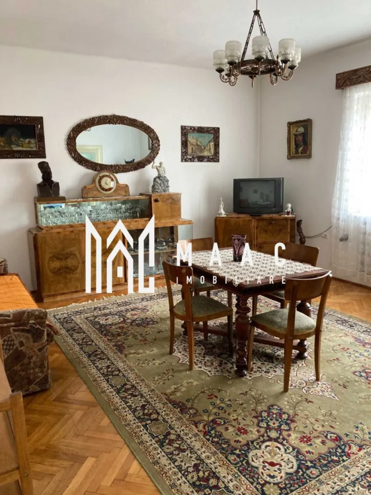 Apartament La Casa | Plus Spatiu Comercial | Ultracentral - MAAC Imobiliare vă propune spre vânzare o casă situată în zona centrală a Sibiului, o proprietate amplasată într-o zonă foarte căutată, potrivită atât pentru locuire, cât și pentru investiție datorită poziționării și funcționalității spațiilor.

Imobilul este compartimentat eficient și oferă camere bine dimensionate, fiind potrivit pentru organizarea unui spațiu de locuit confortabil. Locuința dispune de finisaje clasice și beneficiază de curte comună.

Compartimentarea casei este următoarea:
-2 dormitoare
-birou
-bucătărie deschisă cu living
-baie
-curte comună

Un avantaj important al proprietății îl reprezintă spațiul comercial situat la stradă, care oferă posibilitatea desfășurării unei activități comerciale sau a obținerii unui venit suplimentar din închiriere.

Datorită amplasării în zona centrală a Sibiului, într-o zonă cu cerere ridicată, proprietatea este potrivită atât pentru locuire, cât și pentru investiție.

Pentru mai multe detalii, vă rugăm să menționați telefonic că ați văzut anunțul cu CP1883903.