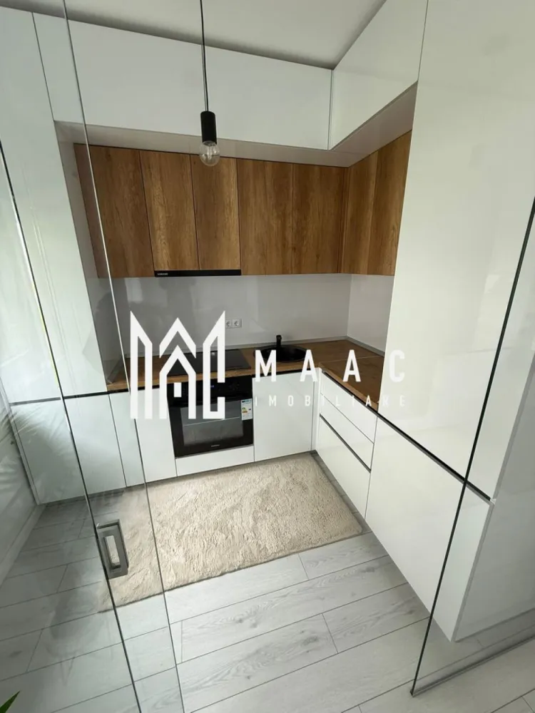 Apartament 2 camere - prima închiriere | Loc de parcare - MAAC Imobiliare vă propune spre închiriere un apartament modern, confortabil și luminos, situat la parterul unui imobil nou. Locuința are o suprafață utilă de 55 mp, la care se adaugă un balcon de 5 mp, și este decomandată, oferind un spațiu bine compartimentat și funcțional.

Detalii și beneficii:

Compartimentare: decomandat, 2 camere (living generos și dormitor spațios)
Bucătărie complet utilată și mobilată
Baie modernă, finisaje de calitate
Loc de parcare inclus în preț
Prima închiriere – totul este nou
Imobil situat într-o zonă liniștită, aproape de puncte de interes (transport, magazine, etc.)

Nu se accepta animale de companie
Se percepe o garantie in valoarea unei chirii lunare.
Disponibil imediat.

Pentru mai multe detalii, vă rugăm să menționați telefonic că ați văzut anunțul cu CP3082277