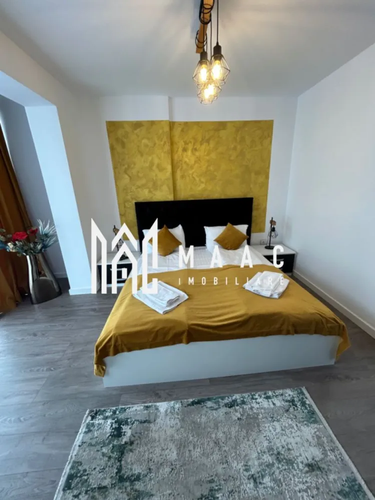 Apartament 2 Camere | 40,8 mp | Loc de parcare | Pivniță | Complex Henri Coandă - MAAC Imobiliare vă propune spre vânzare un apartament modern cu 2 camere, situat în complexul rezidențial Henri Coandă – o alegere ideală atât pentru locuit, cât și pentru investiție.

Locuința dispune de o suprafață utilă de 40,8 mp și este compartimentată inteligent, oferind un ambient plăcut și funcțional:

dormitor luminos, amenajat cu bun gust
living spațios cu bucătărie open-space, perfect pentru relaxare și socializare
baie modernă, dotată cu finisaje de calitate
terasă ideală pentru momentele de relaxare

Un mare avantaj al proprietății îl reprezintă locul de parcare propriu și pivnița, oferind spațiu suplimentar pentru depozitare și un plus de confort în viața de zi cu zi.

Apartamentul se vinde complet mobilat și utilat, fiind amenajat cu atenție la detalii, într-un stil modern și elegant. Finisajele premium și dotările de calitate asigură un nivel ridicat de confort, fiind pregătit pentru mutare imediată sau continuarea activității investiționale.

În prezent, proprietatea este exploatată în regim hotelier, generând un venit atractiv pentru proprietari, ceea ce o transformă într-o oportunitate excelentă pentru cei care își doresc o investiție sigură și profitabilă.

În total sunt disponibile 4 apartamente de acest tip, situate de la parter până la etajul 3, oferind posibilitatea de a alege varianta potrivită în funcție de preferințele dumneavoastră.

Datorită amplasării într-o zonă în continuă dezvoltare, cu acces facil către punctele de interes, acest apartament îmbină perfect confortul cu potențialul investițional.

Pentru mai multe detalii sau pentru a programa o vizionare, vă rugăm să ne contactați și să specificați ID:CP3065638