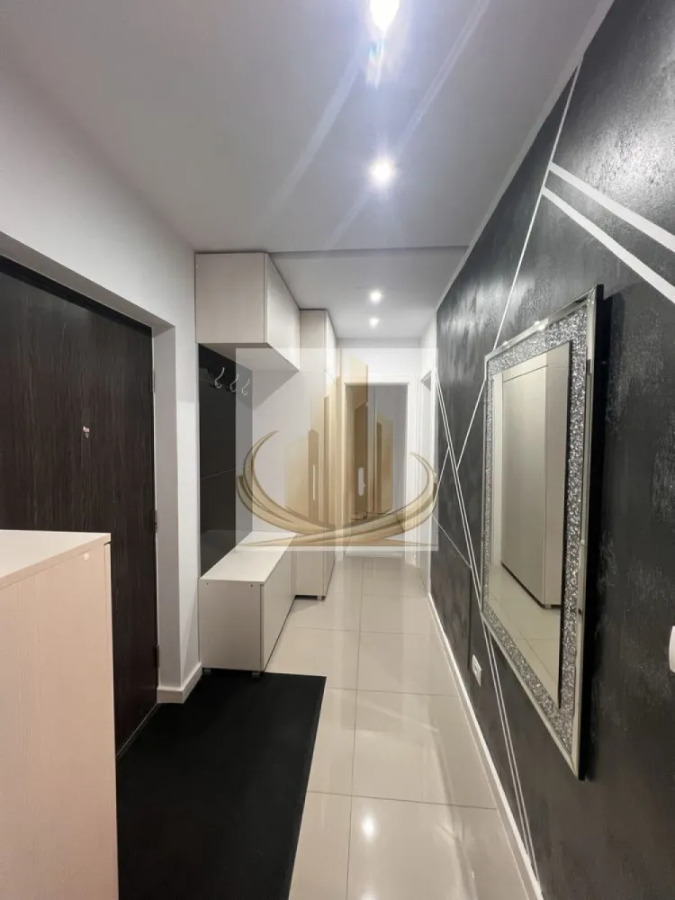 Ap 2 Camere | Parcare Subterană | Iris | Finisaje premium | Investitie - Grand Mobilis Imobiliare vă propune spre vânzare un apartament deosebit cu 2 camere, situat în prestigiosul ansamblu rezidențial Iris Armoniei, unul dintre cele mai apreciate complexe rezidențiale noi din zonă.

Apartamentul are o suprafață utilă de 57.45 mp, la care se adaugă un balcon generos de 7 mp, și beneficiază de loc de parcare subteran complet acoperit, inclus în preț.

Situat la etajul 6 din 11, într-un imobil modern prevăzut cu 2 lifturi KONE, proprietatea se remarcă prin finisajele premium și atenția la detalii.

👉 Apartamentul a fost amenajat la standarde superioare față de celelalte apartamente din complex, proprietarul alegând materiale și finisaje mai moderne și mai calitative decât cele propuse inițial de dezvoltator.

📐 Compartimentare:
Hol de acces
Living luminos
Bucătărie
Dormitor spațios
Dressing
Baie
Balcon generos
🏢 Dotări & finisaje:
Centrală proprie în condensare Vaillant
Încălzire în pardoseală TECE
Aer condiționat 12.000 BTU
Termostate touchscreen în fiecare cameră
Uși premium Porta Doors
Aparataj electric Gewiss
Videointerfon
Tencuieli decorative San Marco
Benzi LED încastrate
Parchet și finisaje premium
Spațiu de depozitare pe balcon cu rulou electric

✔️ Apartamentul se vinde complet mobilat și utilat, exact ca în fotografii.

🌿 Despre complex:

Ansamblul Iris Armoniei beneficiază de:

spații verzi și locuri de joacă
acces securizat
Profi, cabinete medicale, salon și alte spații comerciale chiar în complex
📍 Poziție excelentă:

Situat într-o zonă modernă și foarte bine conectată, cu acces facil către:

magazine și centre comerciale
restaurante și cafenele
școli și grădinițe
mijloace de transport
principalele artere ale orașului
💼 Ideal pentru:

✔️ Locuință premium pentru un cuplu sau o familie
✔️ Investiție excelentă, datorită poziției foarte bune și randamentului ridicat de închiriere din zonă
✔️ Proprietate ideală atât pentru locuit, cât și pentru închiriere pe termen lung, într-o zonă cu cerere ridicată

💰 Preț: 145.000 Euro – negociabil
✔️ Se acceptă și credit bancar.

📞 Pentru mai multe informații și programarea unei vizionări, echipa Grand Mobilis Imobiliare vă stă la dispoziție!
ID Intern: CP3088242
