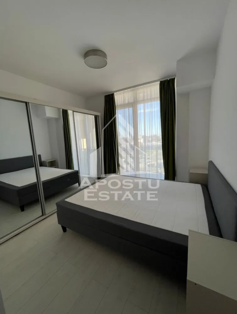 Apartament 2 camere,de inchiriat, zona Aradului Nord One,Timisoara - APOSTU ESTATE va propune spre inchiriere un apartament spatios si elegant, cu 2 camere, situat într-o zona linistita si bine conectata din zona Aradului Nord One, ideal pentru persoane care doresc un spatiu generos si confortabil.

Suprafata utila: 62mp
Etaj : 8/9

Compartimentare eficienta:
- Hol de acces
- Bucatarie deschisa, complet mobilata si utilata si cu loc de luat masa
- Living luminos open-space cu bucataria cu iesire la balcon
- Dormitor matrimonial
- Baie cu cada

Confort si facilitati:
- Centrala termica proprie pe gaz( Încălzire prin pardoseală)
- Aer conditionat
-Masina de spalat vase
-Loc de parcare inclus in pret
Localizare: Zona Aradului Nord One – liniste, acces facil spre oras, in apropiere de magazine, scoli si mijloace de transport in comun.

Ideal pentru:
- Cupluri
-Familii
-Studenti
- Persoane care doresc un spatiu generos si confortabil

Programeaza o vizionare!
Pret chirie : 580 € + garantie 650€ 
ID intern: CP2866300 !