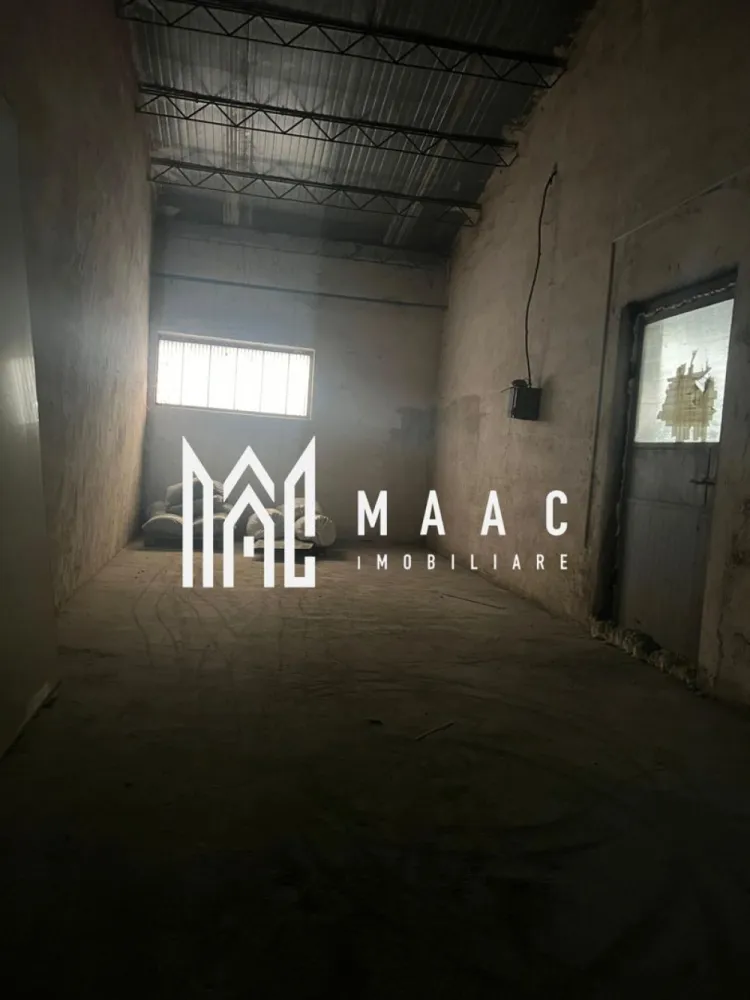 Hala | 380 MP | Teren 800 MP - MAAC Imobiliare vă propune spre închiriere o hală industrială/depozitare, situată în zona centrală a orașului, pe strada Morilor, cu acces facil pentru autovehicule de mare tonaj.

Proprietatea are o suprafață totală de 380 mp, fiind compartimentată astfel:

* spațiu de birouri – 30 mp
* hală/depozit – 350 mp

În completare, imobilul beneficiază de un teren de 800 mp, ce poate fi utilizat ca spațiu de depozitare exterioară, parcare sau zonă de manevră.

Hala este racordată la toate utilitățile necesare desfășurării activităților comerciale sau industriale:

* apă
* curent trifazic
* grup sanitar

Datorită poziționării centrale, accesului facil și suprafețelor generoase, această proprietate este ideală pentru depozitare, logistică, producție ușoară sau activități comerciale.

Preț de închiriere: 3 euro/mp + TVA

Pentru mai multe informații sau programarea unei vizionări, vă invităm să contactați MAAC Imobiliare.

id: CP2860090 - SP