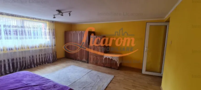 Casa individuala cu 2 apartamente, 6 camere,teren 403 mp,ASTRA.