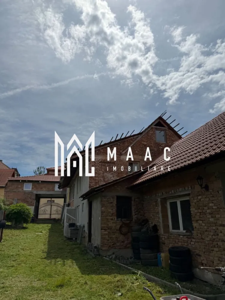 FERMA FUNCTIONALA CU UTILAJE I TAPU I SIBIU - MAAC Imobiliare va ofera spre vanzare o fermă functionala in Comuna Tapu, Judetul Sibiu.
OFERTA 1 
Se vinde proprietate cu 355mp,244mp curte,144mp hală, 3 garaje 75mp,chimniță 35mp,25mp atelier,2500mp grădină 150.000€ NEGOCIABIL 
OFERTA 2
Proprietatea cu toate menționate mai sus împreună cu 2 tractoare (John Deer,Deutz Fahr) plus unelte agricole plus teren agricol 4ha 190.000€ NEGOCIABIL 
Pentru mai multe detalii precizati telefonic ca ati vazut anuntul cu ID CP3093866