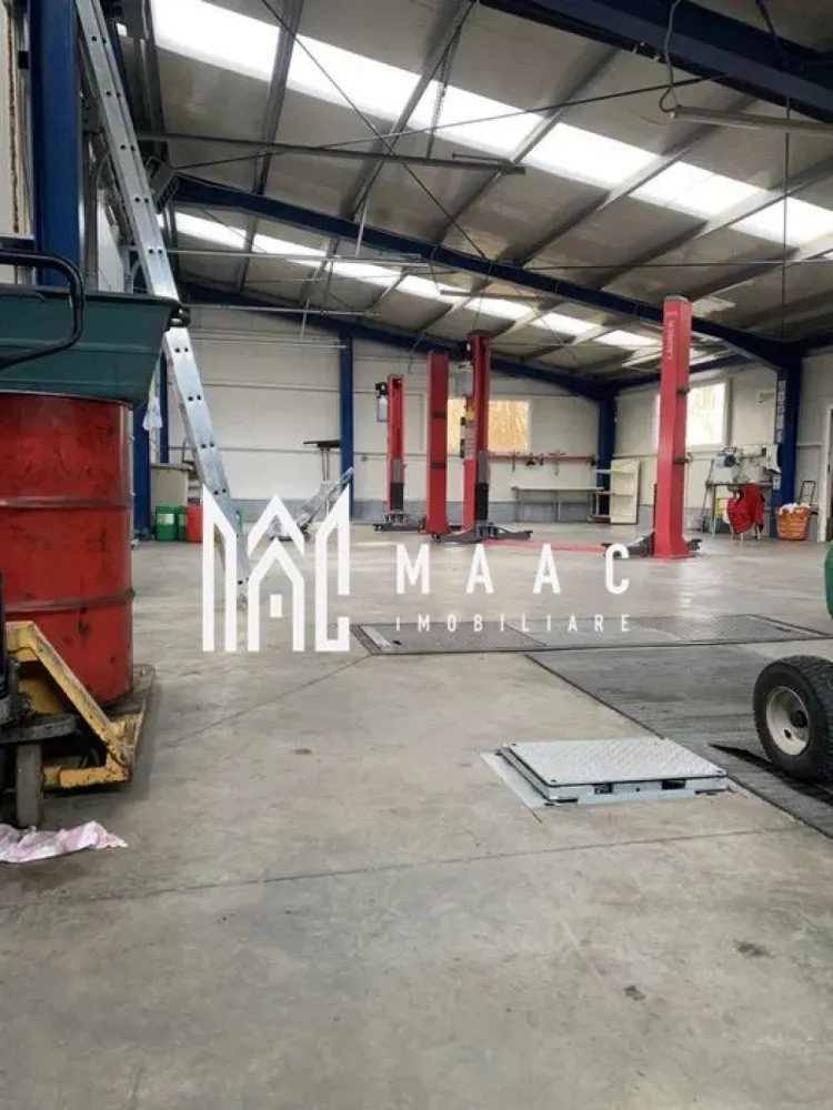 Hala Industrială | Teren 5000 mp | Marșa - MAAC Imobiliare vă propune spre vânzare sau închiriere o hală industrială modernă, situată strategic la intrarea în localitatea Marșa, la doar 100 m de viitoarea autostradă Sibiu–Făgăraș, poziție ce oferă acces rapid și vizibilitate excelentă.

Proprietatea funcționează în prezent ca service auto / vulcanizare / spălătorie self-service și este dotată integral cu echipamente profesionale necesare activităților de service auto, stație ITP și vulcanizare.
Hala poate fi preluată cu activitatea existentă sau poate fi adaptată pentru alte destinații: depozitare, producție, logistică, atelier etc.

Caracteristici principale

Suprafață teren: 5.000 mp (împrejmuit complet cu gard metalic, fundație beton și panouri bordurate)

Construcție finalizată în 2019

Structură metalică, panouri sandwich 10 cm, tâmplărie PVC

Spațiu interior compartimentat: birouri, recepție clienți, vestiar, spații depozitare, 2 grupuri sanitare

Curte pavată

Acces TIR

3 porți secționale

Poartă automată la intrare

Sistem de supraveghere video și antiefracție

Curent trifazic, apă curentă, canalizare

Încălzire centrală (aeroterme + calorifere)

Șapă elicopterizată

Utilizări recomandate

service auto / ITP / vulcanizare

depozit / logistică

mică producție

spălătorie auto

activități comerciale / industriale

Pentru informații suplimentare sau pentru a programa o vizionare, vă rugăm să ne contactați și să specificați ID:CP2831857
