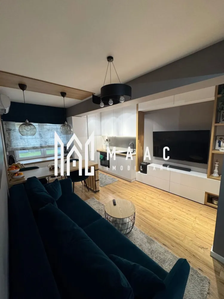 Apartament 3 camere | 70 MPU | Parter | Turnisor - MAAC Imobiliare vă propune spre vânzare un apartament situat într-o zonă rezidențială liniștită, într-un bloc nou, construcție finalizată în decembrie 2021, amplasat pe strada Eduard Bielz, într-un ansamblu cu regim de înălțime P+1+etaj retras.

Detalii proprietate:

Suprafață utilă: 70 mp
Etaj: parter
Compartimentare: decomandat

Structură:

2 dormitoare
Living cu bucătărie open space
Hol
2 băi
Balcon

 Parcare:

2 locuri de parcare incluse în preț:
1 loc subteran
1 loc suprateran

 Dotări și stare:

Apartamentul se vinde complet mobilat și utilat
Bloc modern, bine întreținut
 Facilități ansamblu:
Curte interioară
Loc de joacă pentru copii
Pentru mai multe detalii precizati telefonic ca ati vazut anuntul cu ID: CP2862376