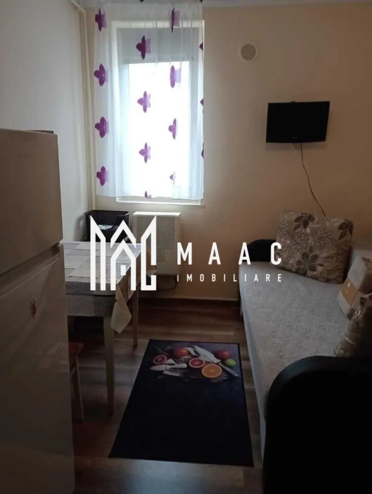 Garsoniera | Etaj 2 | 12 MPU | Investitie | Hipodrom 1 - MAAC Imobiliare vă propune spre vânzare o cameră situată în Sibiu, potrivită atât pentru locuit, cât și pentru investiție sau închiriere.

Locuința dispune de toate dotările necesare pentru confortul zilnic, fiind pregătită pentru mutare imediată.

Detalii proprietate
Cameră luminoasă și eficient compartimentată
WC pe hol
Spații de depozitare
Ideală pentru o persoană sau investiție
Dotări și beneficii
Boiler pentru apă caldă
Cabină de duș
Chiuvetă în cameră
TV
Frigider
Plită electrică
Cuptor cu microunde
Masă și mobilier inclus
Pat
Geam termopan
Ușă metalică
Finisaje:
gresie
faianță
parchet
Avantaje
Complet mobilată și utilată
Costuri reduse de întreținere
Disponibilă imediat
Pretabilă pentru investiție și închiriere
Avantaje locație
Aproape de:
magazine
stații de autobuz
farmacii
centre comerciale
Acces rapid către principalele zone ale orașului

Pentru mai multe informații sau pentru a programa o vizionare, nu ezitați să ne contactați, specificand ID: CP3107198