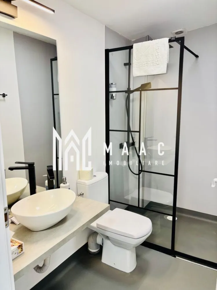 Pensiune 11 Camere | 700Mp | Valea Avrigului | Teren 4600Mp - MAAC Imobiliare vă propune spre vânzare o proprietate de excepție în Valea Avrigului – zonă turistică premium

Vă prezentăm două proprietăți situate pe același teren, într-una dintre cele mai căutate zone turistice din județul Sibiu – Valea Avrigului, locație ideală atât pentru investiție, cât și pentru locuire permanentă.

 Casa 1 – Pensiune / Proprietate turistică
O construcție solidă, cu potențial excelent de exploatare turistică sau organizare evenimente.
Suprafață utilă: 700 mp
10 camere
10 băi 
Sală de mese / living generos
Bucătărie completă
Sală de conferințe / evenimente
Ideală pentru pensiune, retreat-uri, team building-uri sau evenimente private.

 Casa 2 – Casă de locuit

Perfectă pentru proprietar sau administrator, oferind confort și intimitate.
Suprafață utilă: 130 mp
2 camere
Living
Bucătărie
Baie + hol

Teren și facilități
Suprafață teren util: 4.600 mp
Curte mare, zonă verde amenajată
Loc de joacă pentru copii
Foișor
Acces facil

 Avantaje cheie
Zonă turistică extrem de căutată
Proprietate versatilă – investiție + locuire
Cadru natural deosebit, liniște și intimitate
Potențial ridicat de dezvoltare și randament

Pentru mai multe detalii sau pentru a programa o vizionare, vă rugăm să ne contactați specificând ID:CP2865720