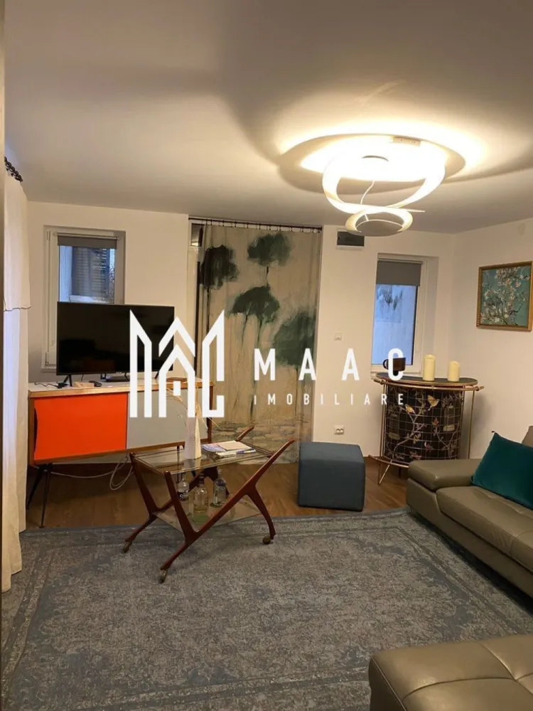 Casă | 80 MPU | Curte | Sub Arini - MAAC Imobiliare vă propune spre închiriere o casă cu 2 camere, situată într-o zonă premium și deosebit de căutată din Sibiu, în imediata apropiere a parcului Sub Arini. 

Poziționarea oferă un echilibru perfect între liniștea naturii și accesibilitatea rapidă către punctele de interes ale orașului.

Proprietatea este dispusă pe un singur nivel, fiind o construcție solidă din caramidă, realizată în anul 1985 și complet pregătită pentru a deveni noua dumneavoastră locuință. 

Casa are un acoperiș oblic din țiglă si beneficiază de o curte individuala împrejmuită, ideala pentru relaxare.

Caracteristicile principale ale proprietății sunt următoarele:

Casă pe un singur nivel (construcție din cărămidă, an 1985)

 2 camere:
dormitor 

bucătărie închisă

baie cu cabină de duș

Suprafață teren: 250 mp (curte individuală împrejmuită)

Sistem de încălzire: Centrala proprie pe gaz

Utilități complete: Apa curentă, electricitate, canalizare, țeavă de gaz, internet, cablu TV, telefon

Tamplărie si finisaje: Tâmplărie termopan

Elemente de siguranță: Obloane și ușă metalică la intrare

Condiții închiriere:

Nu se acceptă animale de companie

Se percepe garanție în cuantumul unei chirii 

Dacă aceasta proprietate corespunde cerințelor dumneavoastră și doriti să locuiți într-una dintre cele mai verzi zone din oraș, nu ezitați să ne contactați pentru a programa o vizionare sau pentru a obține informații suplimentare specificând codul de identificare al proprietății ID: CP3111952.