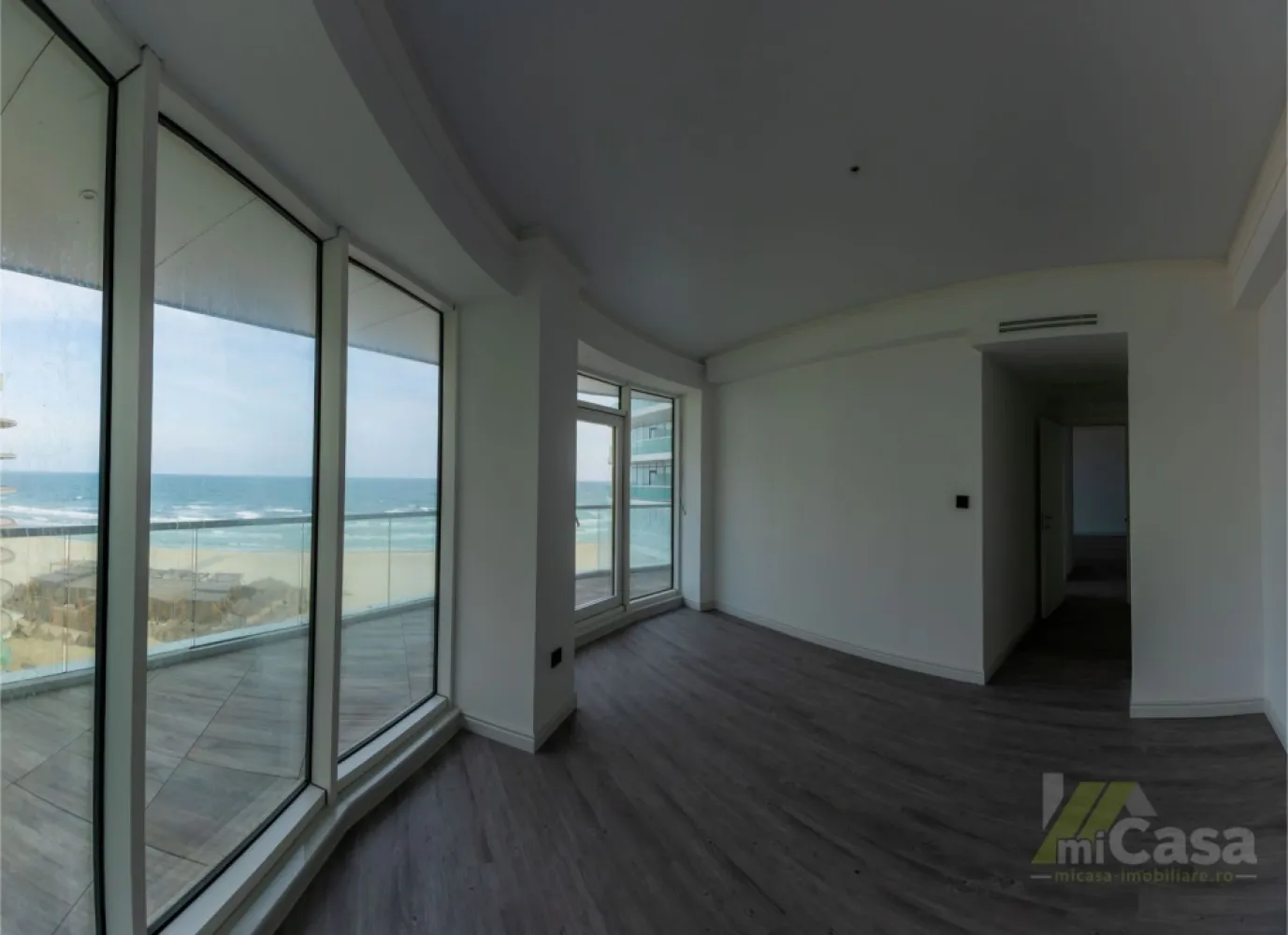 Apartament 3 Camere - Complex Rezidențial WHITE SEA - Mamaia - Apartament 3 camere - Etaj 7 - Complex Rezidențial WHITE SEA

miCasa imobiliare vă prezintă un apartament modern, situat la etajul 7 al unui complex rezidențial deosebit, cu o suprafață totală de 128,4 mp. Apartamentul este de tip 6, conform planului etajelor 1-8, și beneficiază de o distribuție optimă a spațiilor.

Structura apartamentului:

Living + Bucătărie: 24,19 mp – un spațiu generos și luminos, ideal pentru momentele de relaxare sau socializare, completat de o bucătărie modernă, perfect integrată.
Dormitor: 17,78 mp – un dormitor spațios, care oferă confort și intimitate, fiind locul ideal pentru odihnă.
Dormitor: 12,97 mp – un dormitor spațios, care oferă confort și intimitate, fiind locul ideal pentru odihnă.
Baie: 4,45 mp – baie modernă, dotată cu toate facilitățile necesare.
Baie: 4,28 mp – baie modernă, dotată cu toate facilitățile necesare.
Hol: 11,63 mp – un hol bine gândit, care face legătura între încăperile apartamentului.
Terasa: 32,6 mp – locul perfect pentru a te bucura de aerul curat și de o vedere spectaculoasă la mare.

Caracteristici suplimentare:

Izolație fonică: Apartamentul beneficiază de o izolație fonică excelentă, asigurându-vă confortul necesar pentru o viață liniștită.
Eco friendly: Tehnologii eco-friendly pentru un trai sustenabil, reducând impactul asupra mediului.
Smart home: Apartamentul este echipat cu sistem smart home, care vă permite să controlați cu ușurință iluminatul, temperatura și alte funcționalități ale locuinței dintr-o aplicație mobilă.
Vedere la mare: Bucurați-vă de o priveliște deosebită asupra mării, perfectă pentru momente de relaxare sau pentru a savura apusurile.
Complex rezidențial: Locuința se află într-un complex rezidențial de top, oferind facilități moderne, siguranță și un mediu plăcut și liniștit pentru întreaga familie.

Acest apartament reprezintă alegerea perfectă pentru cei care doresc confort, modernitate și o locație deosebită cu vedere la mare.

Contactați-ne pentru mai multe detalii sau pentru a programa o vizionare!

Cumperi prin miCasa Imobiliare? Primești mai mult decât o locuință.
👉 Ai comision 0 și până la 10% reducere la materialele de amenajare interioară marca miCasa.

Cumpără inteligent. Renovează cu stil.