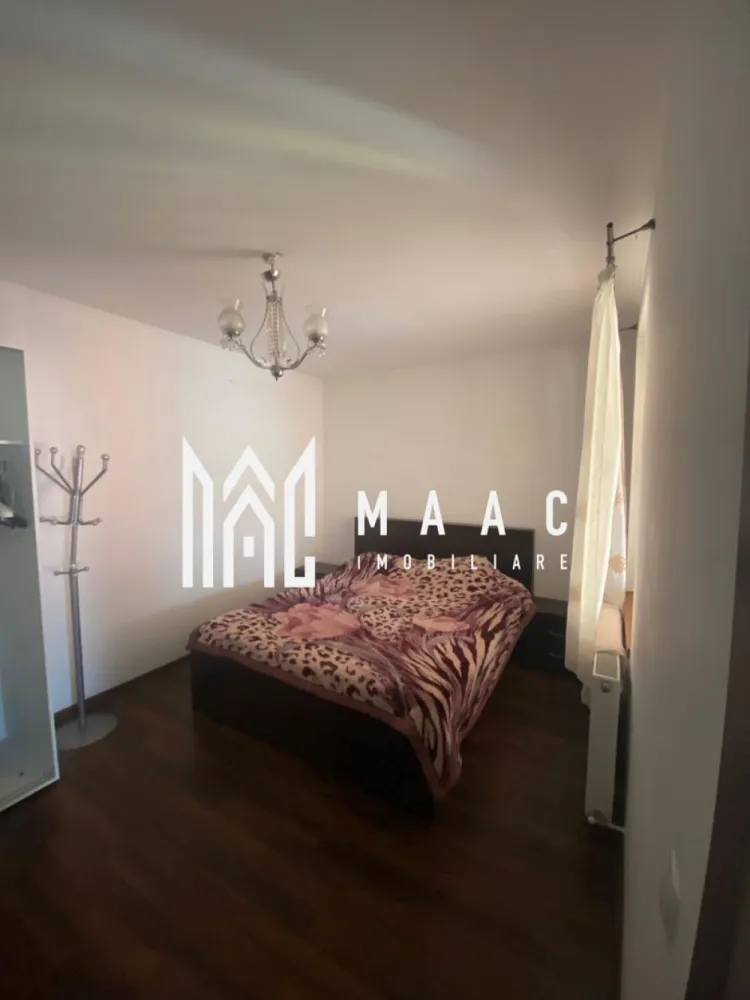 Casa individuală 5 camere I Curte I Utilități I Rasinari - MAAC Imobiliare vă prezintă o casă individuală elegantă, situată într-o zonă bună din Rășinari, pe stradă privată, oferind liniște, intimitate și un cadru rezidențial deosebit, la mică distanță de Sibiu.

Suprafețe conform Cărții Funciare:
Suprafață teren: 567 mp
Suprafață construită desfășurată: aproximativ 297 mp

Compartimentare:

Parter:
-Living
-Bucătărie separată
-Dormitor / birou
-Baie

Etaj:
-3 dormitoare luminoase
-Dressing generos
-Baie

Facilități și avantaje:
-Bucătărie de vară
-Anexe
-Curte privată
-Acces exclusiv pe stradă privată, pentru un plus de confort și siguranță

Proprietatea este intabulată, cu acte la zi, și reprezintă o alegere excelentă atât pentru locuință de familie, cât și pentru investiție sau reședință de vacanță, într-una dintre cele mai căutate zone din apropierea Sibiului.

Pentru detalii suplimentare și pentru programarea unei vizionări private, vă rugăm să menționați telefonic că ați văzut proprietatea cu numărul de CP: CP2889012.