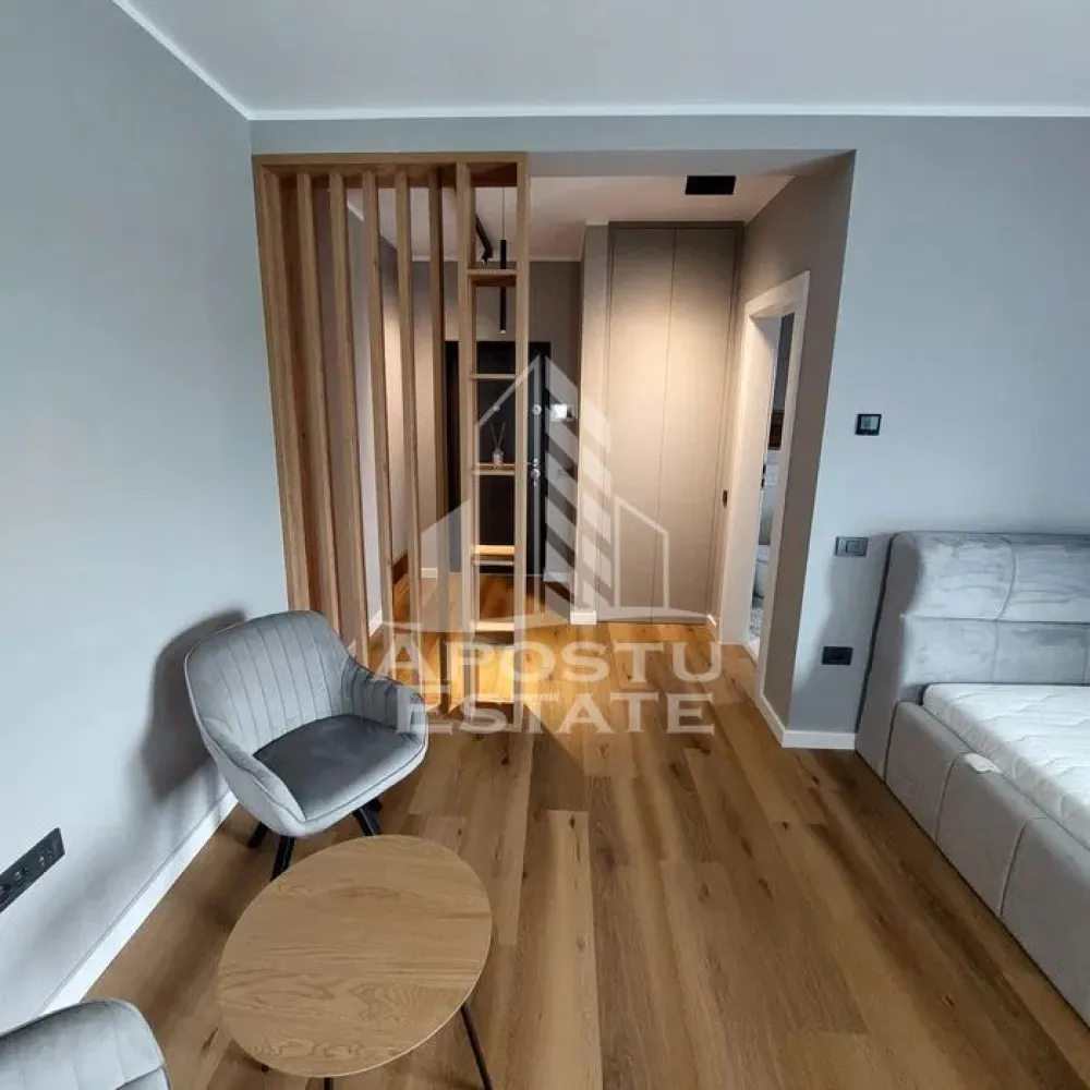 Apartament cu 1 camera, de inchiriat. Dumbravita, Centrala proprie - Agentia imobiliara APOSTU ESTATE va propune spre inchiriere un apartament cu 1 camera, spatios si luminos, situat in Dumbravita, intr-o zona linistita si bine pozitionata, potrivit pentru cupluri,familii, sau studenti care isi doresc o locuinta unde sa se simta confortabil si cu acces facil catre scoli, statii de autobuz, supermarketuri , magazine de zona, parcuri.

Suprafata utila: 39 mp
Compartimentare eficienta:
-Hol de acces generos.
-Living room luminos cu bucatarie open space.
-Baie prevazuta cu cabina de dus.

Confort si facilitati:
-Incalzirea apartamentului: Pardoseala, Centrala proprie.
-Apartamentul este complet mobilat si utilat.
-Nu se accepta animale de companie de catre proprietar.

Localizare:
-Timis, Dumbravita – acces facil : Profi Super, Elite Kindergarten,, Parcul Napoli.

Ideal pentru:
-Cupluri.

Disponibilitate: imediata
Pret chirie lunara: 400 euro ( negociabil)
Programeaza o vizionare pentru a-ti putea imagina viitorul aici!
ID intern: CP3125308