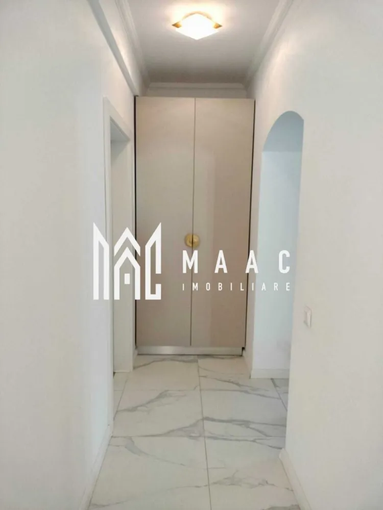 Apartament 3 camere | Etaj 1 | Balcon | Pivnita | 67 MPU | Ultracentral - MAAC Imobiliare vă propune spre vânzare un apartament cu 3 camere, decomandat, situat la etajul 1, într-o zonă rezidențială liniștită, ideal pentru locuință proprie sau investiție. Proprietatea beneficiază de o compartimentare practică și de o orientare est–vest, oferind lumină naturală pe tot parcursul zilei și un confort sporit în utilizarea spațiilor interioare.

Apartamentul are o suprafață construită desfășurată de 82,04 mp și este decomandat, asigurând intimitate și funcționalitate pentru fiecare încăpere. Amplasarea la etajul 1 oferă acces facil și un echilibru optim între confort și accesibilitate.

Compartimentarea este eficient organizată:
-Living
-2 dormitoare
-Bucătărie
-Baie
-Hol

Proprietatea se vinde mobilată, fiind pregătită pentru mutare imediată sau pentru închiriere. În plus, apartamentul dispune de:
-2 balcoane
-Pivniță în suprafață de 11,04 mp
-Posibilități de parcare în curtea imobilului

Pentru mai multe detalii, precizați telefonic că ați văzut anunțul cu numărul CP2889959.
