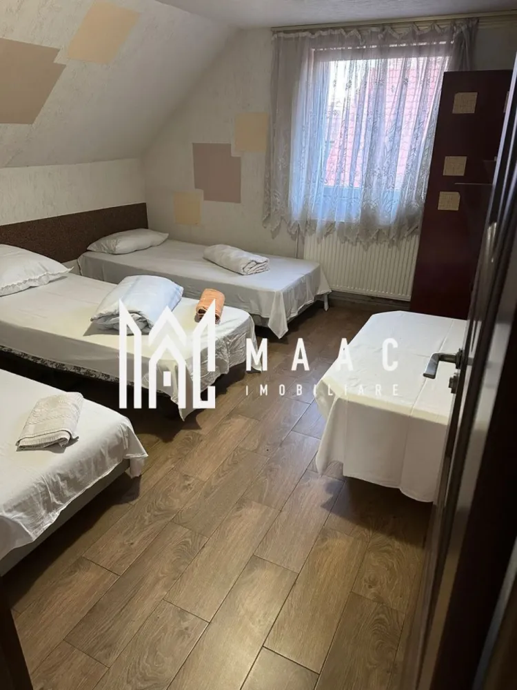 Casa cu 4 apartamente | 9 camere | Curte si Gradina - MAAC Imobiliare ofera spre inchiriere casa cu 4 apartamente cu toate facilitatile, in zona Veterani.

Locuinta are suprafata utila de 250 de mp, desfasurati pe doua nivele. Aceasta este alcatuita din 4 apartamente cu 2 camere spatioase, 4 bai, si inca o camera separata cu baie. Se regaseste bucatarie si baie in fiecare apartament.

Casa are curte si gradina proprie, cu spatiu pentru gratar, sau alte activitati de relaxare.

Se poate parca in curte sau in apropiere, fara probleme. Se pot parca maxim 15 masini in fata casei. Si este si un loc propriu amenajat.

Pretabil pentru firme cu muncitori, dar nu neaparat. Se inchiriaza pe minim un an, se percepe o garantie in cuantumul unei chirii lunare.

Pretul este usor negociabil, in functie de perioada contractuala.

Pentru mai multe detalii precizati telefonic ca ati vazut anuntul cu ID: CP2084922